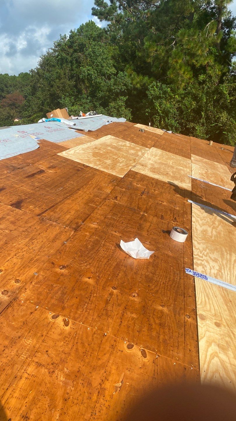 Commercial Roofing Installation using Roof Replacement by American Roofing & Construction LLC