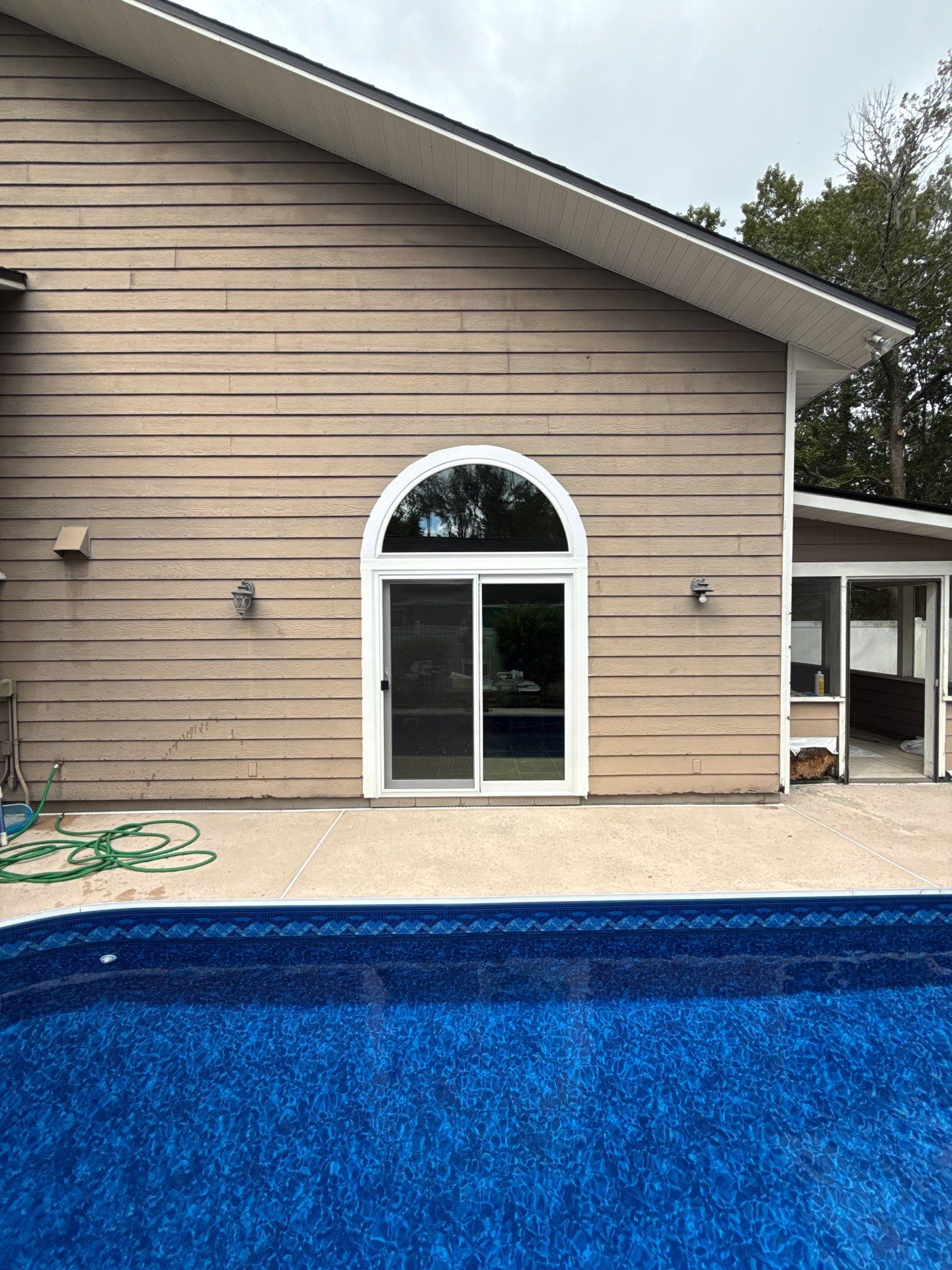 Custom Arched Transom and Sliding Patio Door Replacement in Gainesville by Windows & Doors Store