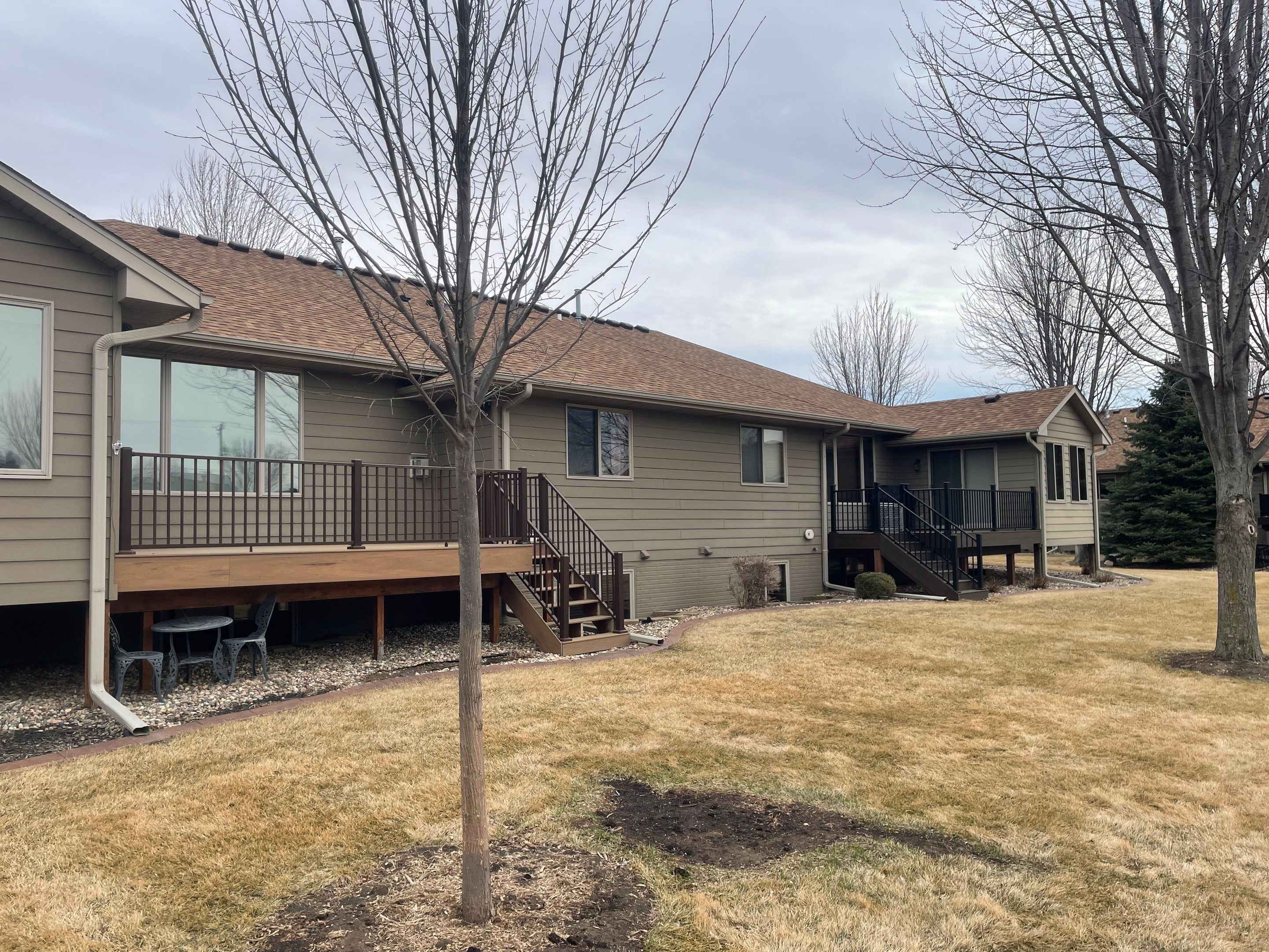 Residential Exterior Siding and Trim Painting in Sioux Falls by Select Painting, Coatings & Garage Cabinets