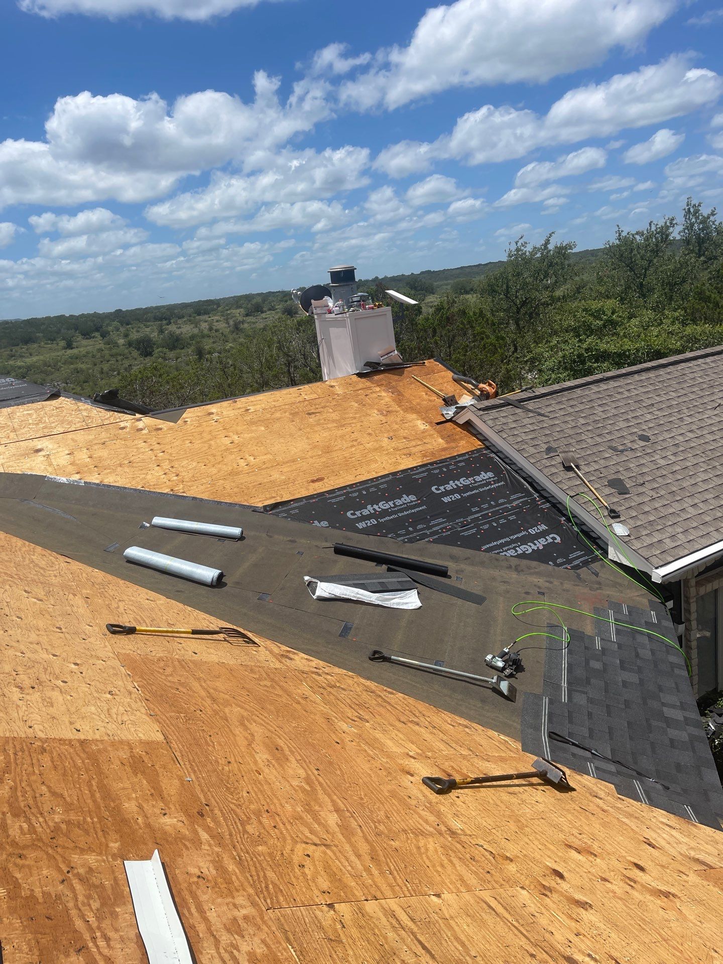 Residential Roofing Installation using IKO Nordic Granite Black by DeZign Roofing & Exteriors