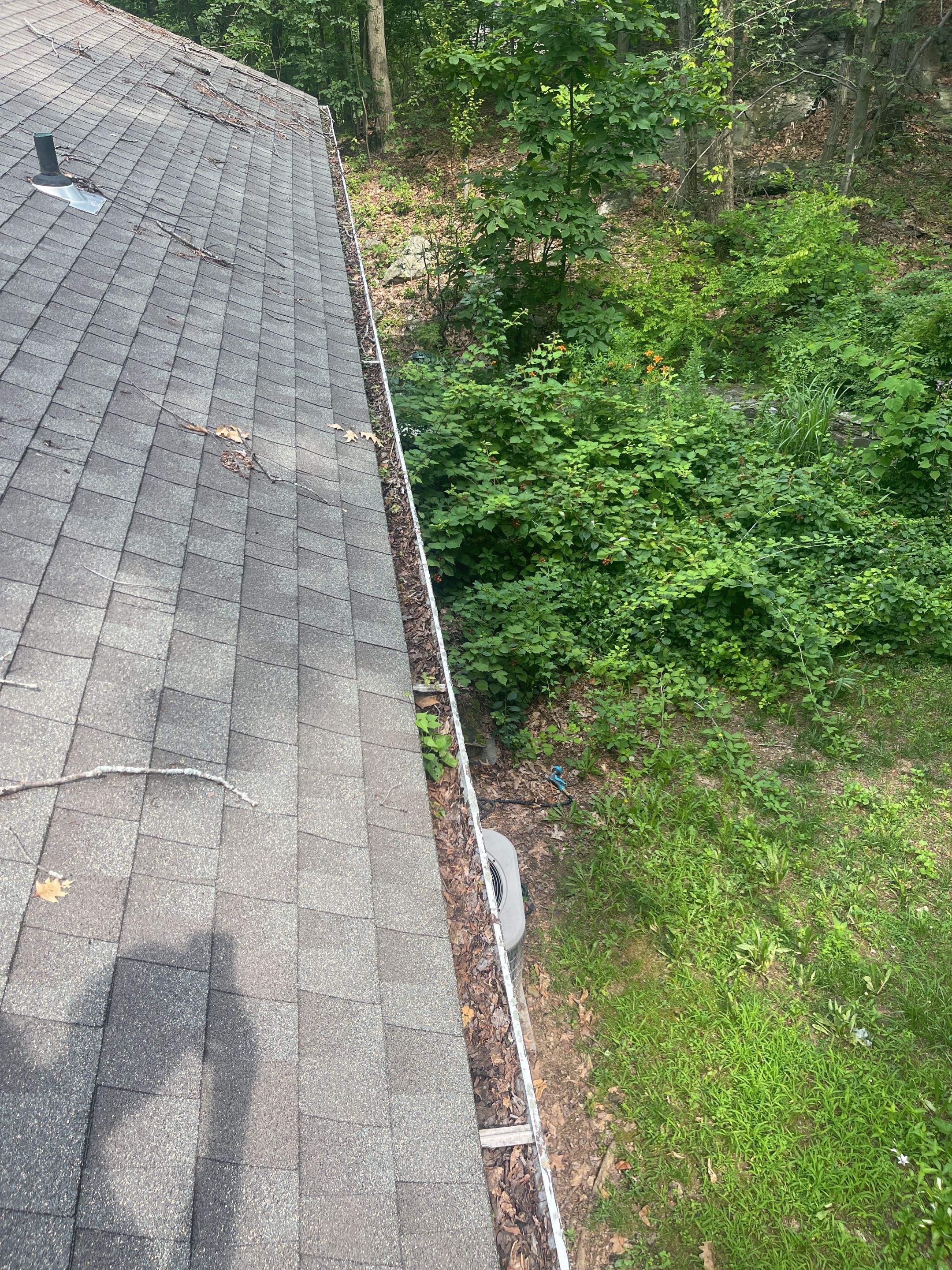 Gutter Installation using 5k Brown Gutters by A Plus Exterior