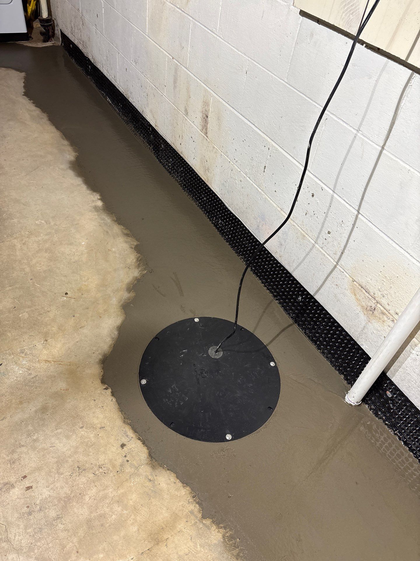 Drain tile & a sump pump for Ruth by Waterproofing Northeast