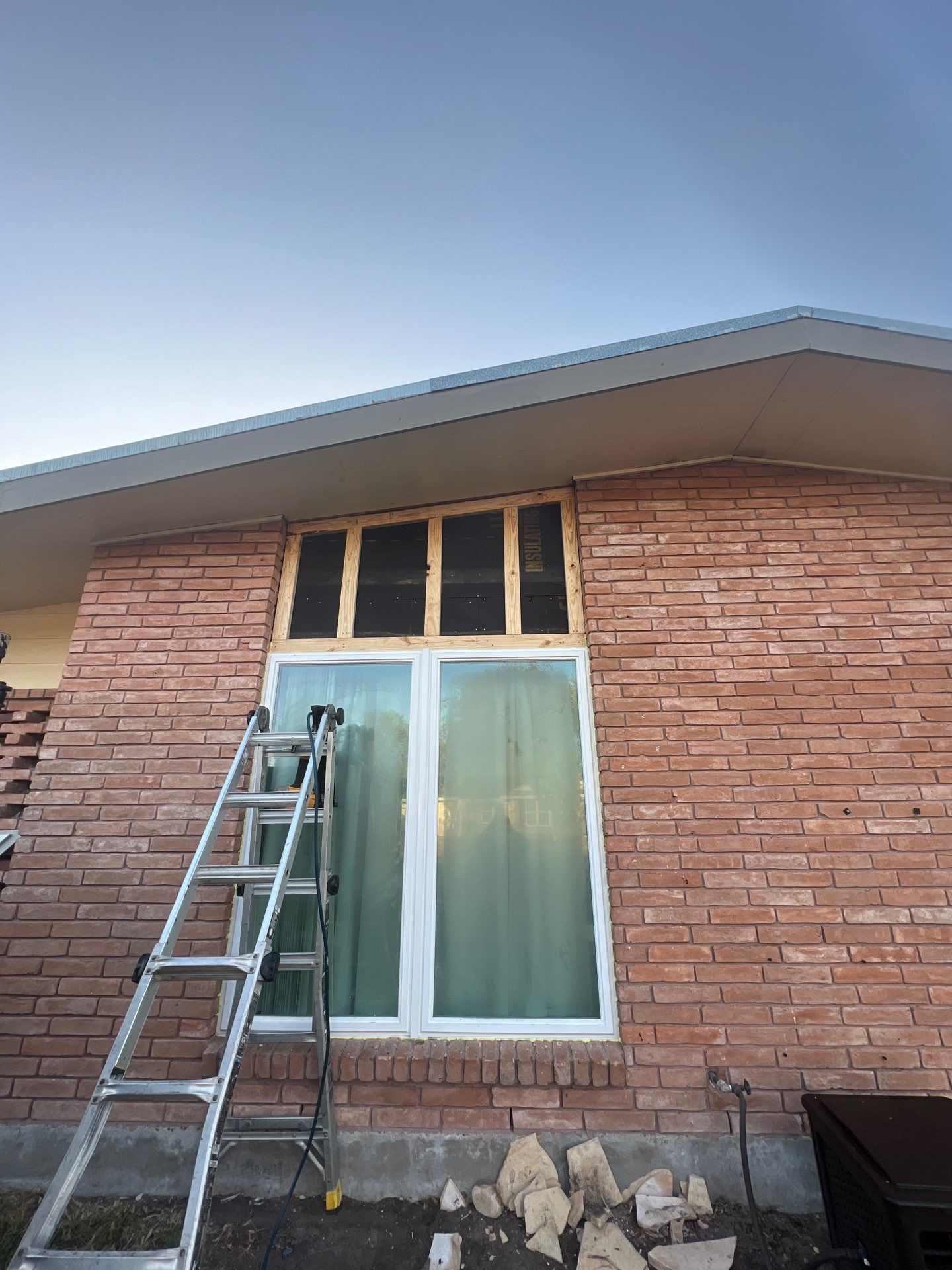 Windows in Brick with a Bay Window by Bayfront Roofing and Construction
