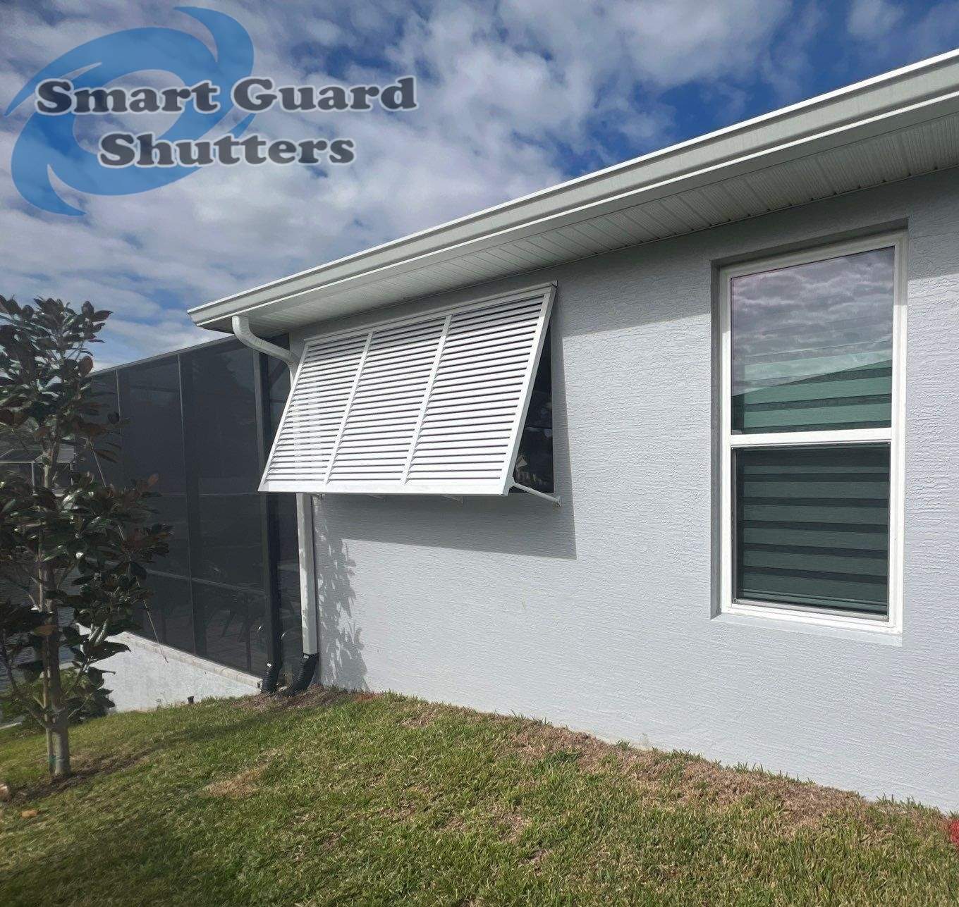 Decorative Bahamas in Signal White by Smart Guard Shutters