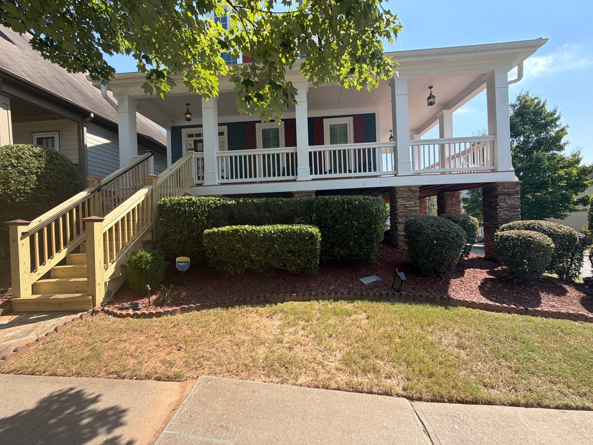 Atlanta Exterior Home Refresh with Blue Siding and Deck Staining by Swift Home Renovations 