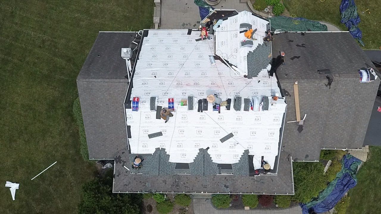 Full Roofing Replacement and Gray Shake Hardie Siding Installation in Butler by Cousins Roofing Siding & Decks