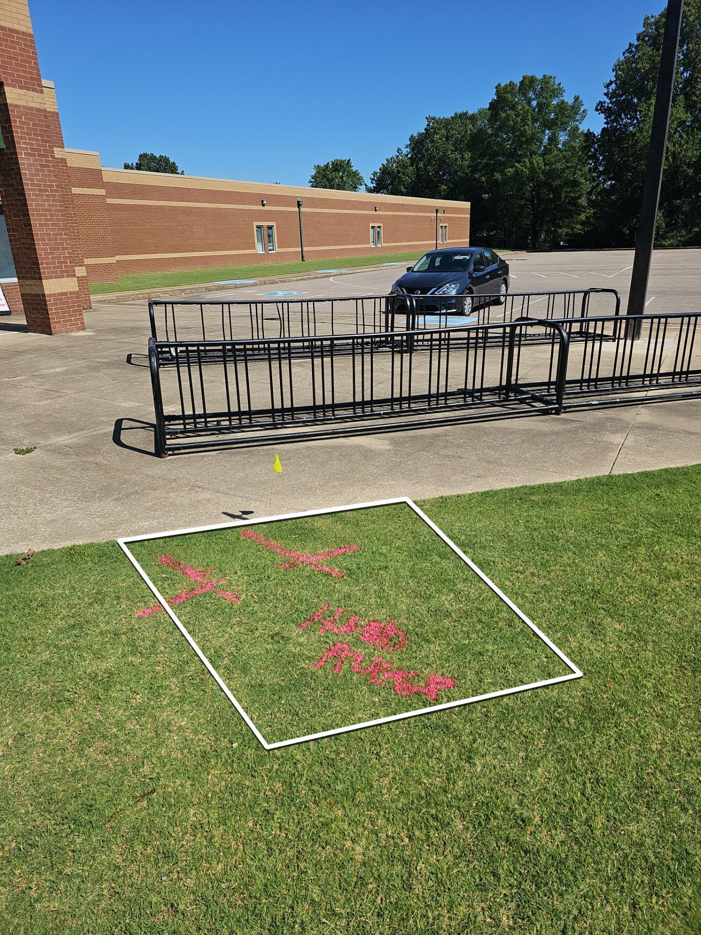 Utility Locating at a school for fence install by Alsip Locating Service, LLC