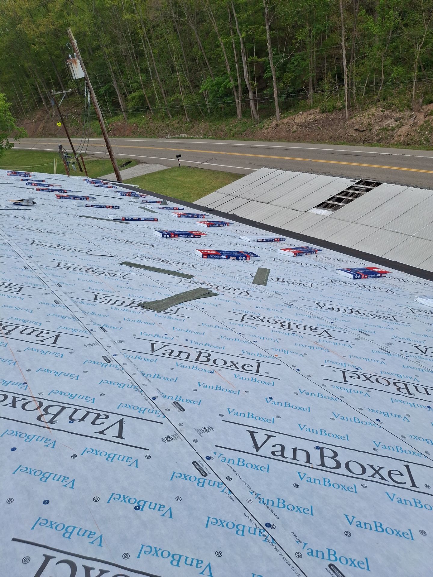 Commercial Roofing Installation using GAF Timberline HDZ Barkwood by Rainstoppers Roofing