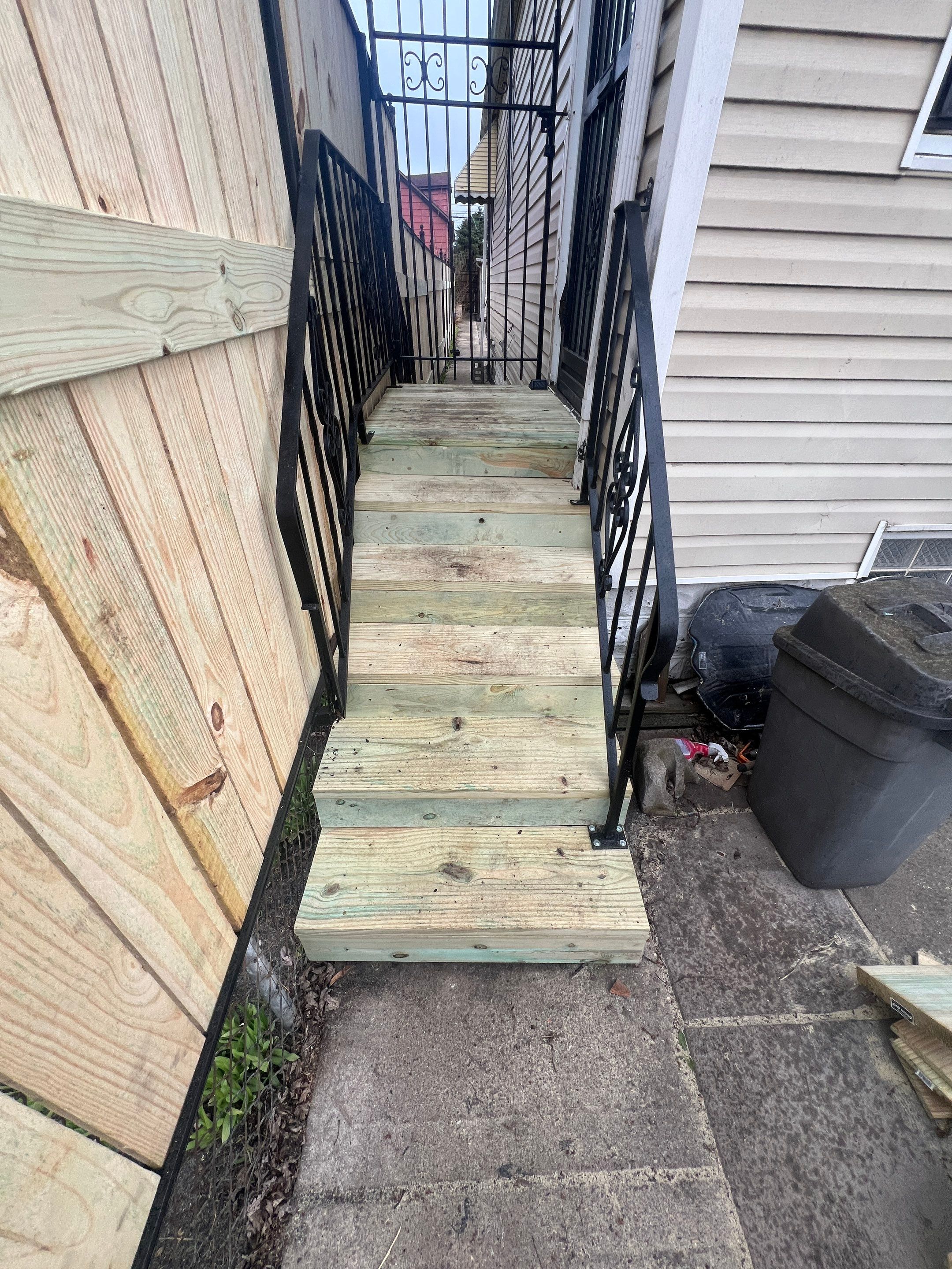 Fence Installation using pressure treated lumber  by INQUSE GENERAL CONTRACTOR