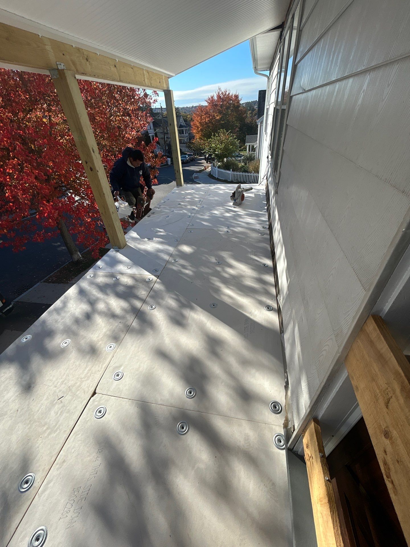 Watertown Porch EPDM Rubber Roof Installation by Mighty Dog Roofing of Greater Middlesex County