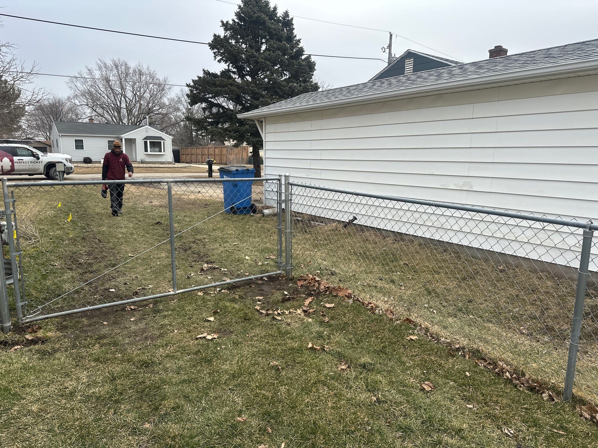 Galvanized Chain Link Fence and Vinyl Gate Installation in Washburn by Perfect Picket Fence and Stain