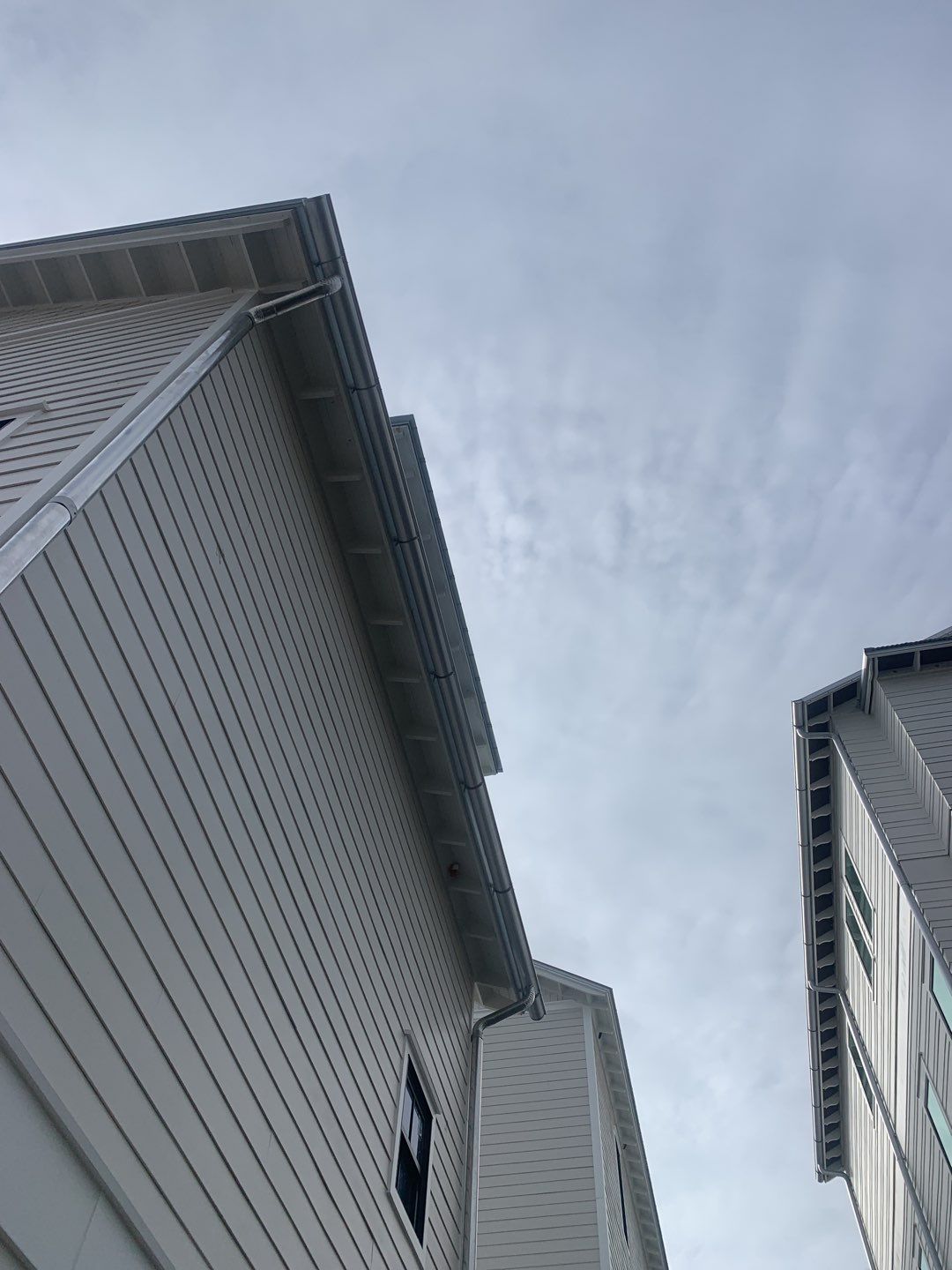 Half-Round Gutters in Galvalume Color in Santa Rosa Beach FL by Gutter Professors