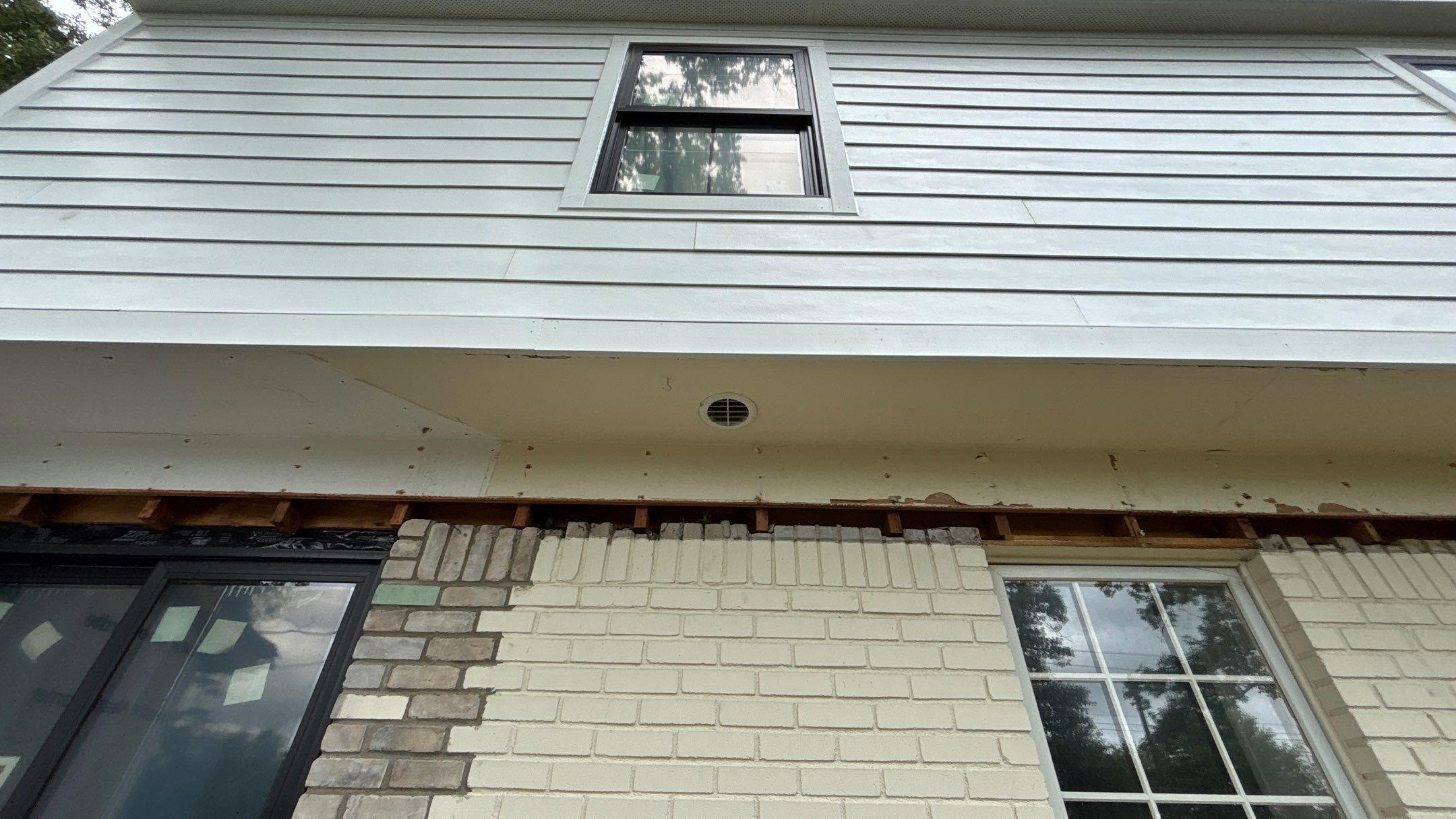 Siding Replacement using Hardie Plank S8 1/4"  Arctic White by 180 Contractors