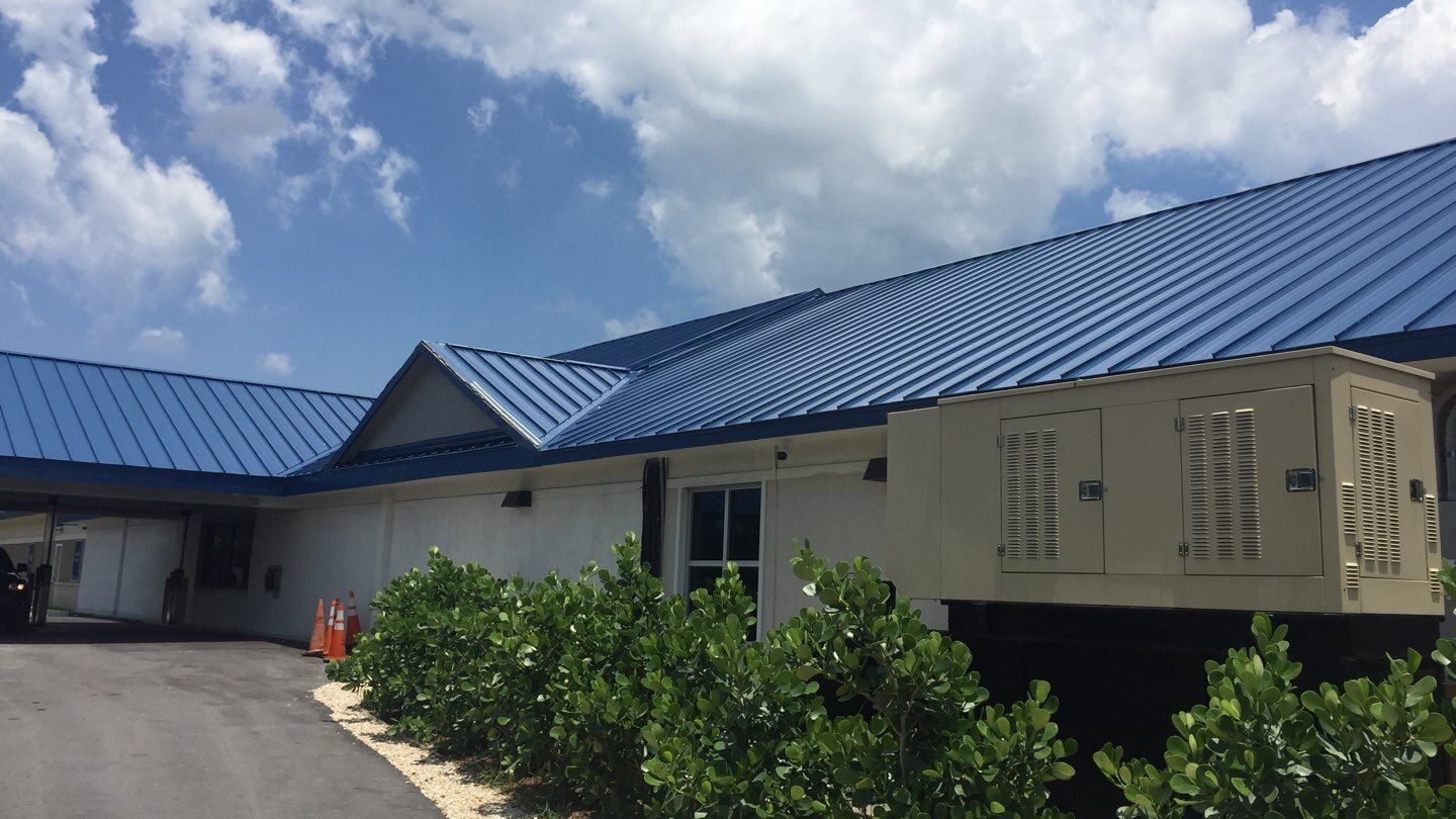 Residential Roofing Installation using 1.5'' Mechanical Seam by BLUES BROTHERS CONSTRUCTION CORP