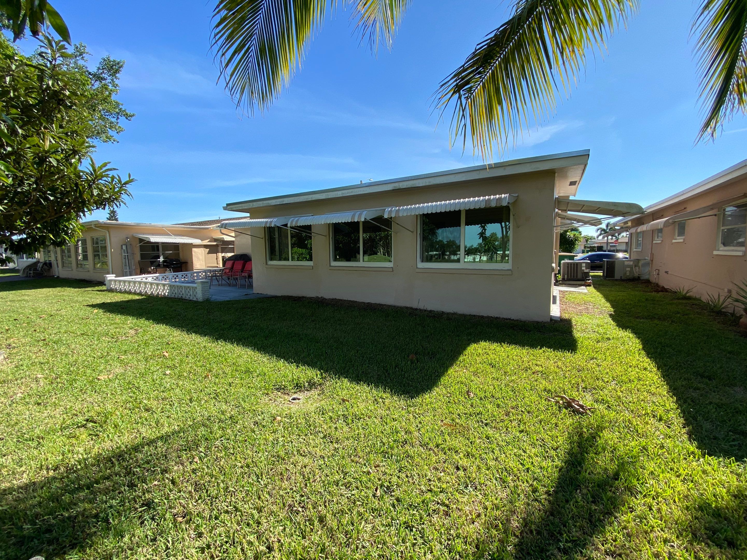 Tamarac Residential Entry Door and Aluminum Window Installation Project by The Door Doctor of South Florida, Inc.