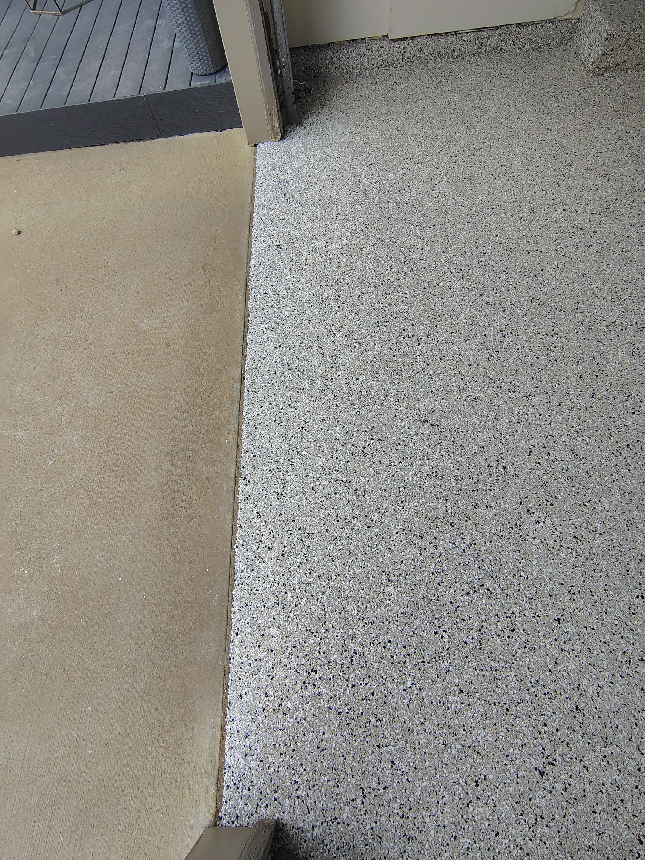 Full-Flake Epoxy Garage Floor Coating Installation in Sioux Falls by Select Painting, Coatings & Garage Cabinets