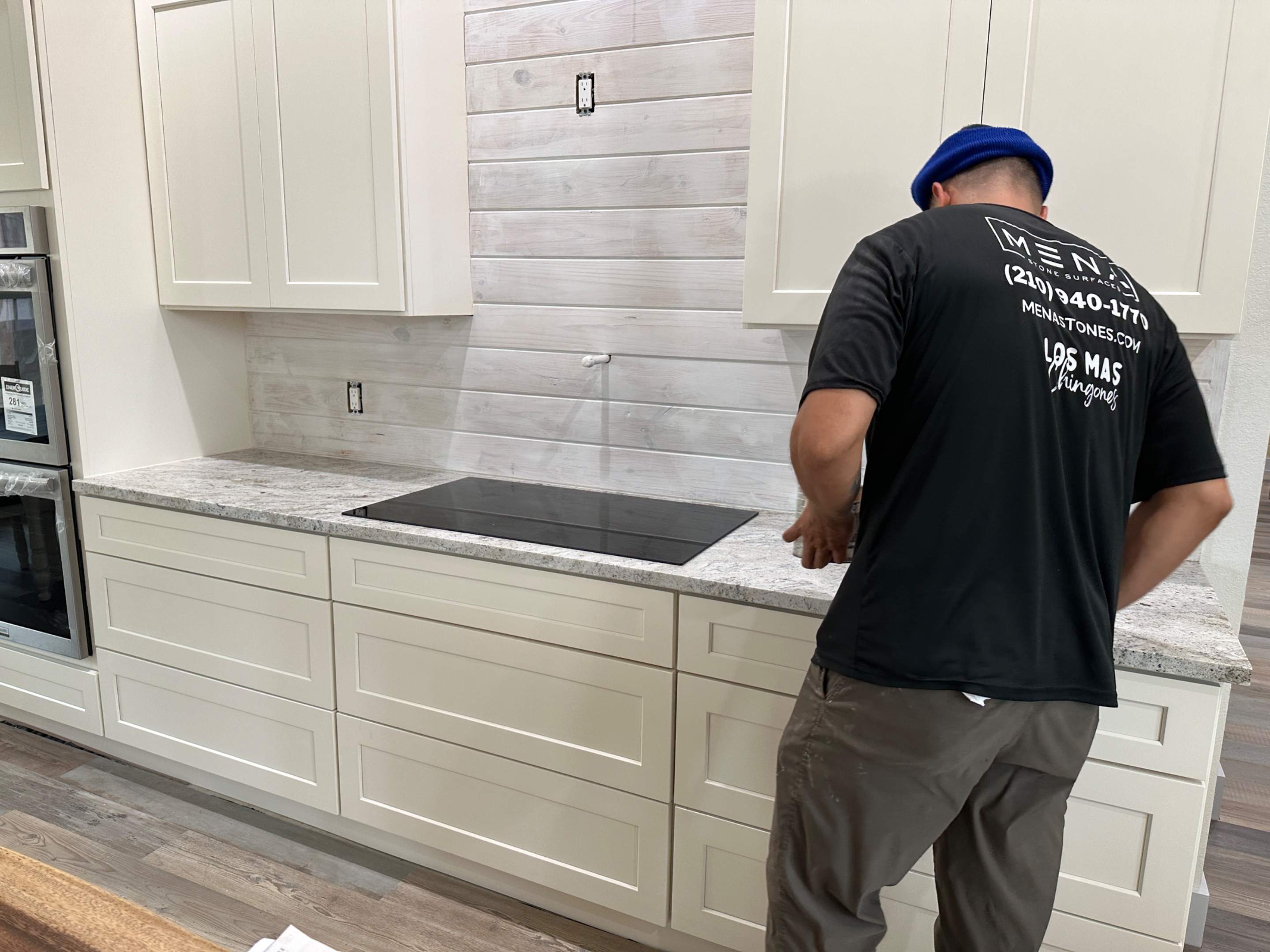 Antique shaker cabinets and granite kitchen and bathroom installation by Mena stone surfaces