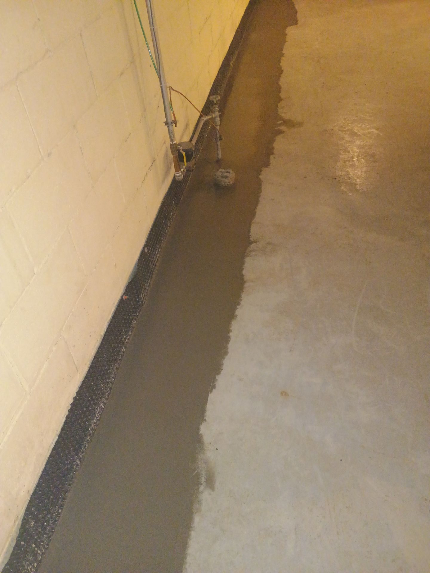 Drain Tile & Sump Pump for Kassie's Rental Property by Waterproofing Northeast