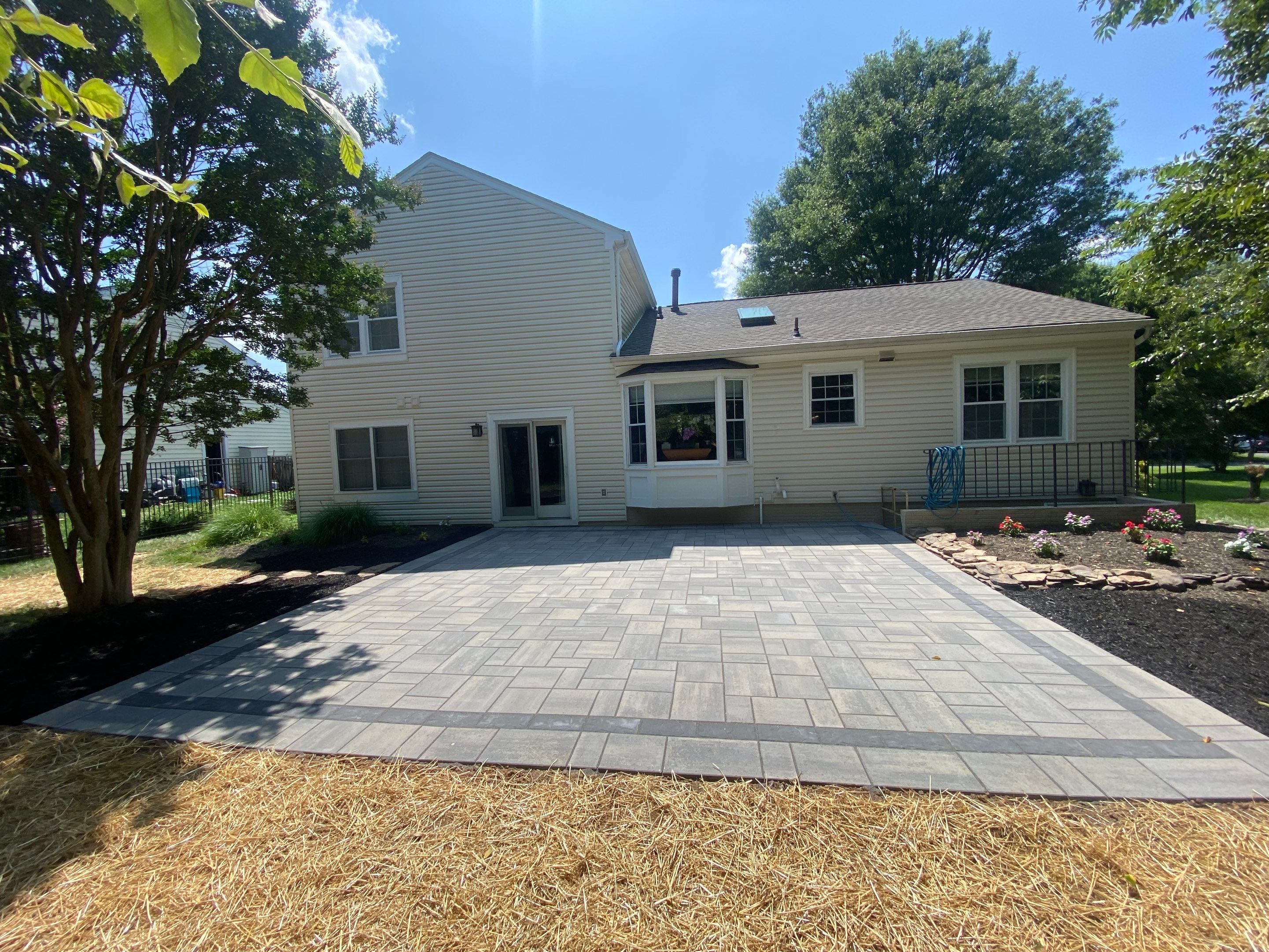 Backyard Transformation using Techo-Bloc Pavers by The Smet Companies, LLC