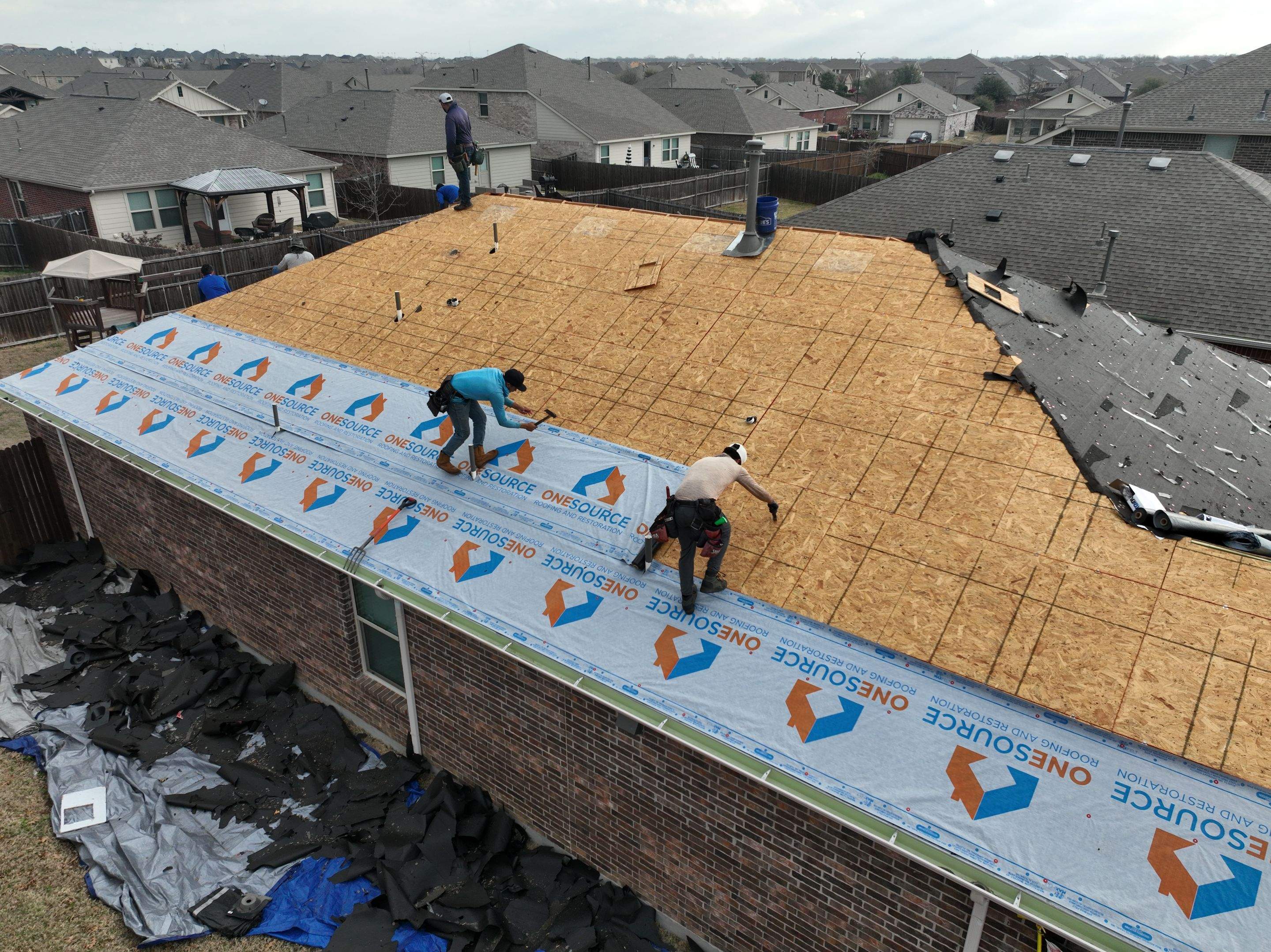 Residential Roofing Installation using Malarkey Highlander Weathered Wood Plus by OneSource Roofing and Restoration