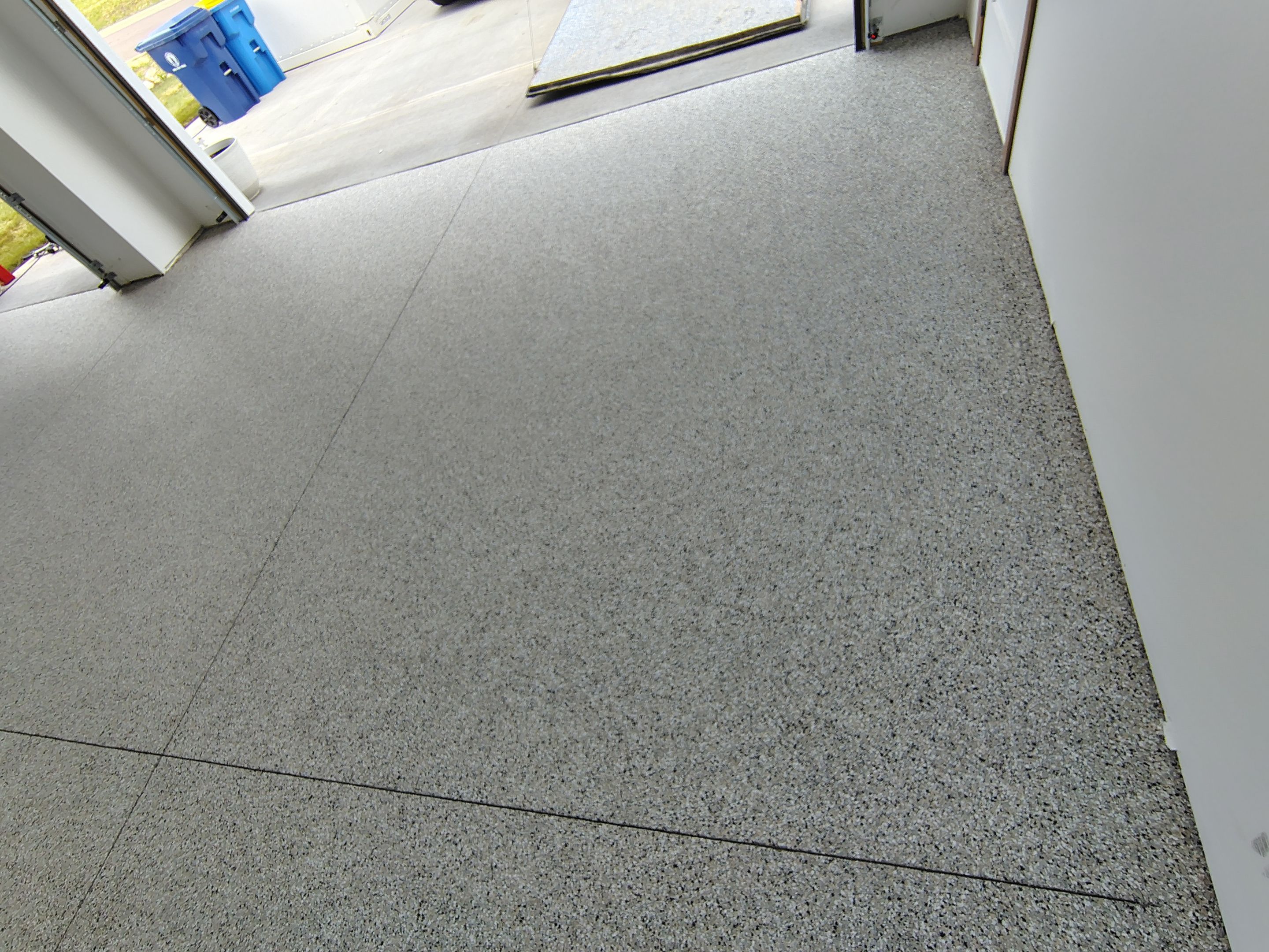Gray and White Speckled Epoxy Garage Floor Coating in Tea by Select Painting, Coatings & Garage Cabinets