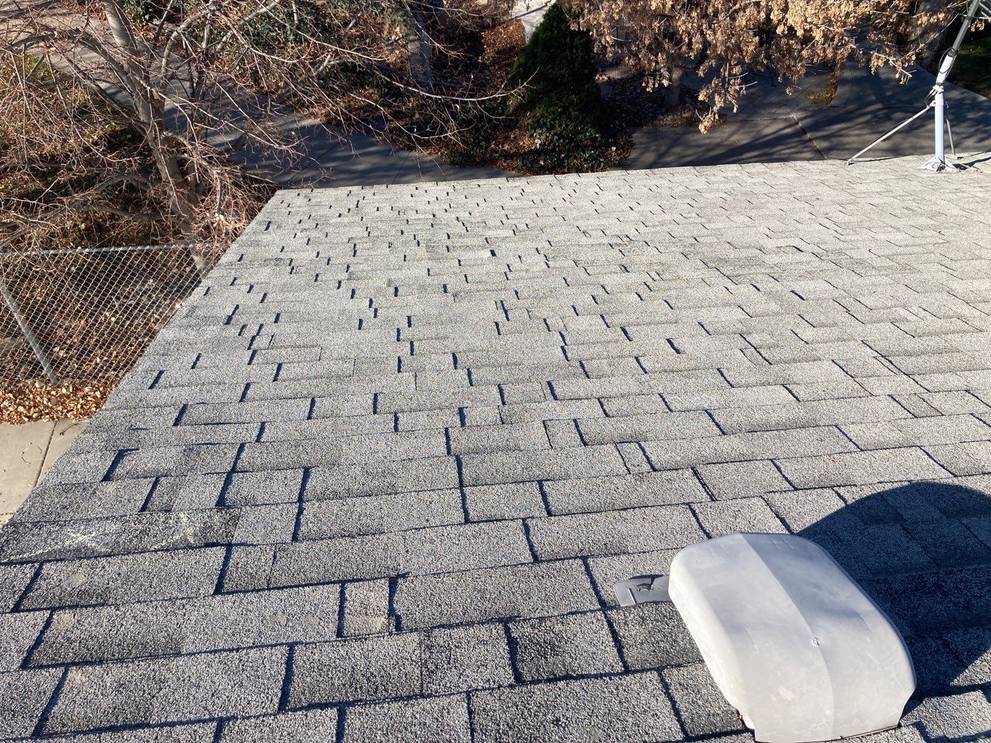 Two story farmhouse style roofing installation using Owens Corning Duration in the color Teak by ID Roofing LLC