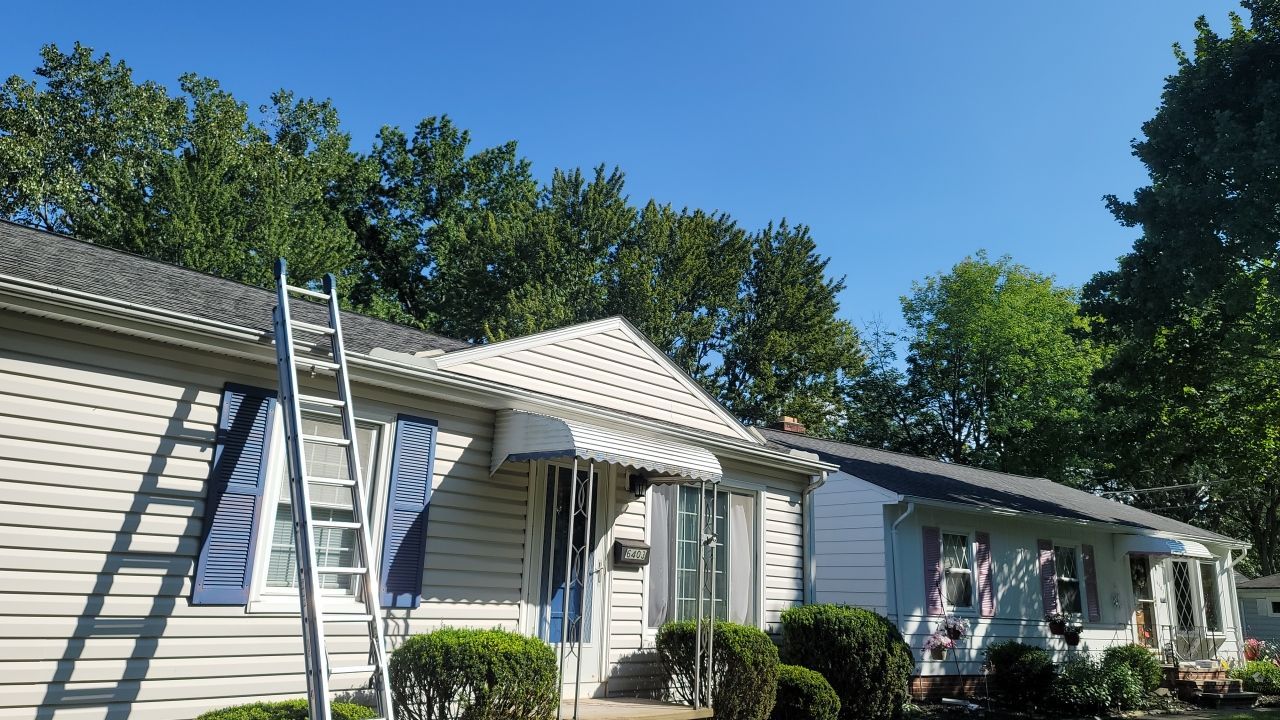 ATLAS PINNACLE COLOR: PRISTINE BLACK SHADOW DRIP EDGE: WHITE by Eagle Eye Roofing