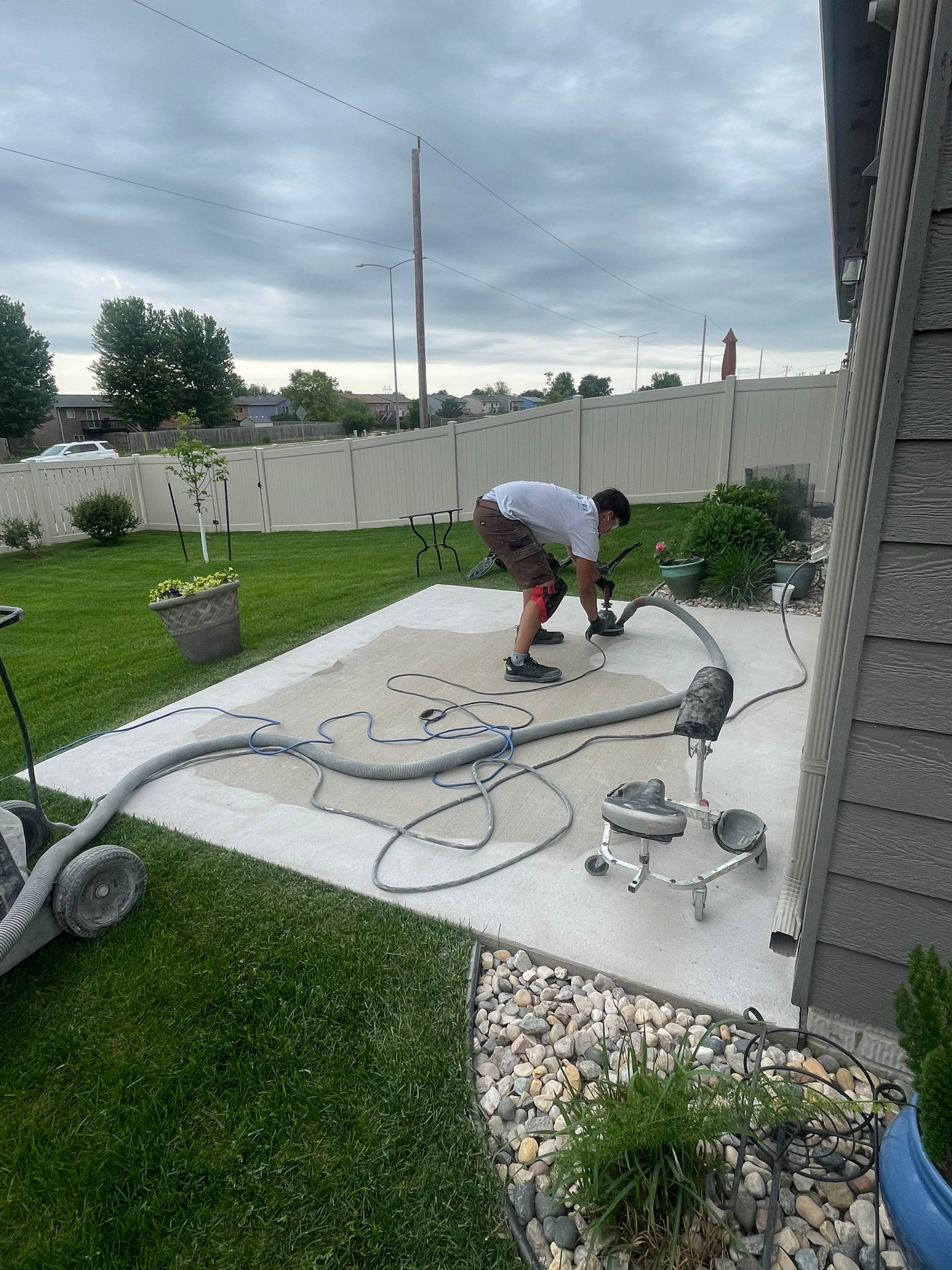 Custom Concrete Coating for Sioux Falls Patio and Front Walkway by Select Painting, Coatings & Garage Cabinets