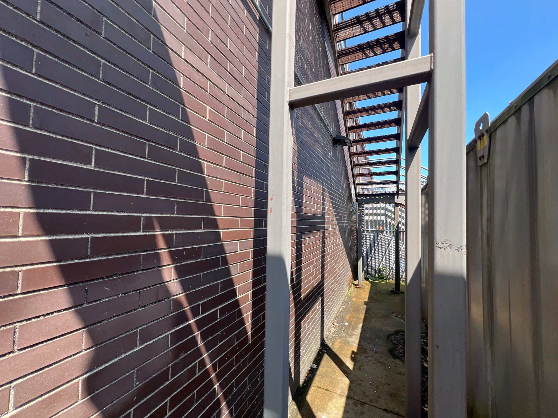 commercial pressure washing using Algaecide, soft wash soap by Northern Power Washing LLC.