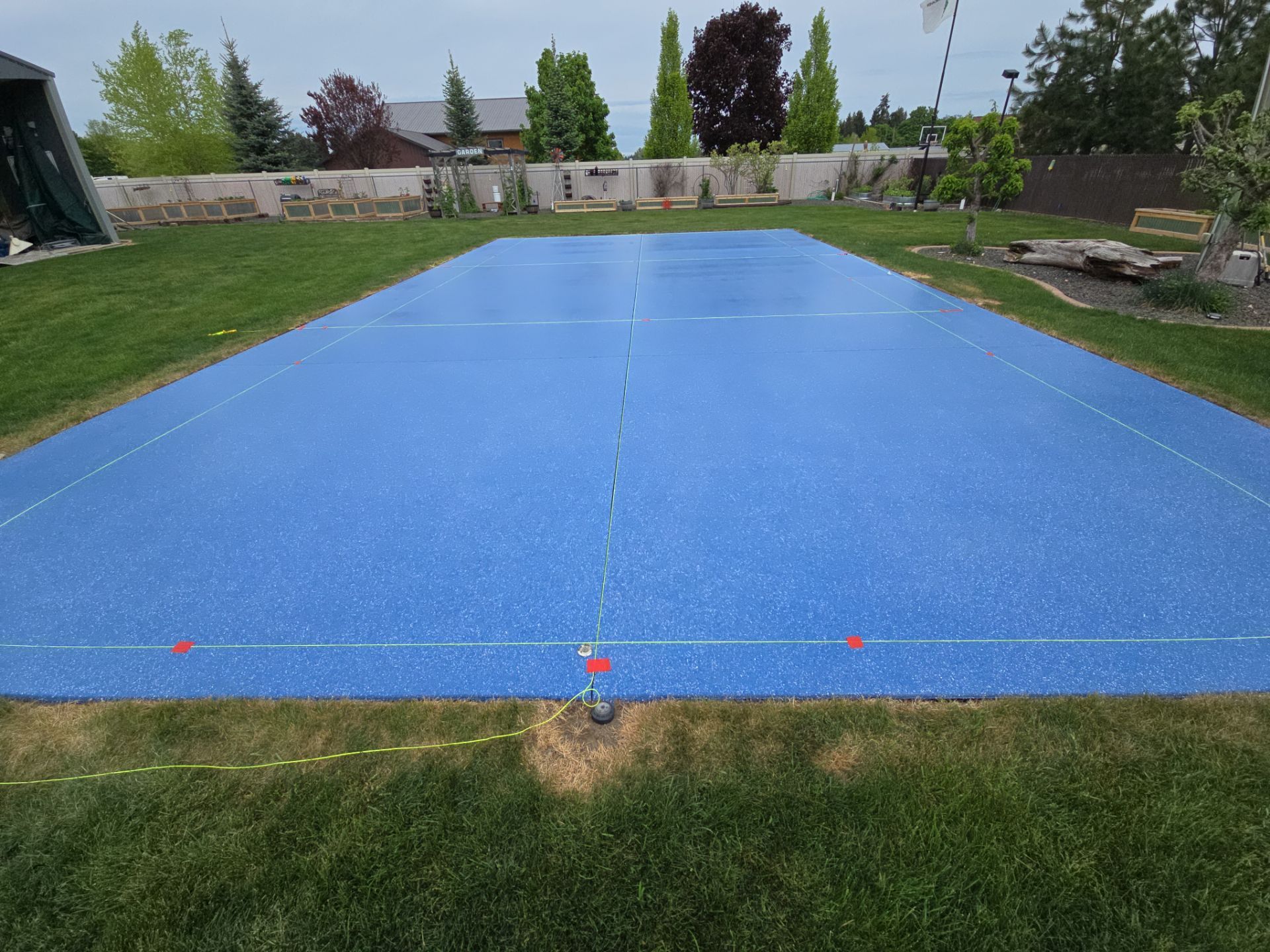 Sports Court Transformation using Ocean Hybrid by Croc Coatings, LLC