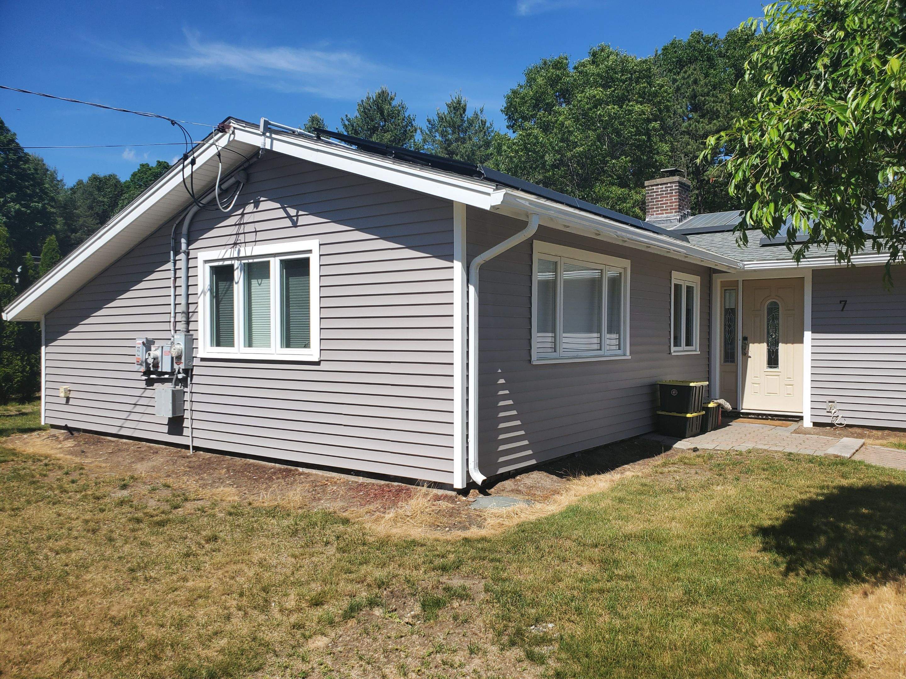 Siding Installation using insulation, PVC trim and vinyl siding by UBrothers Construction