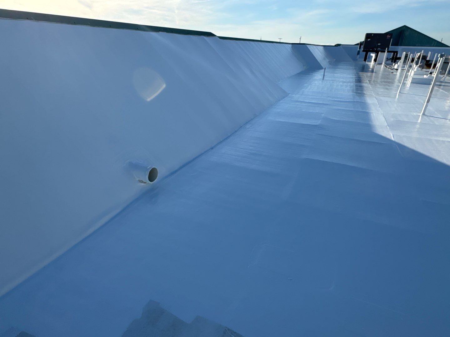 Commercial White Silicone Roof Coating for Hotel in Oldsmar by CES Roofing