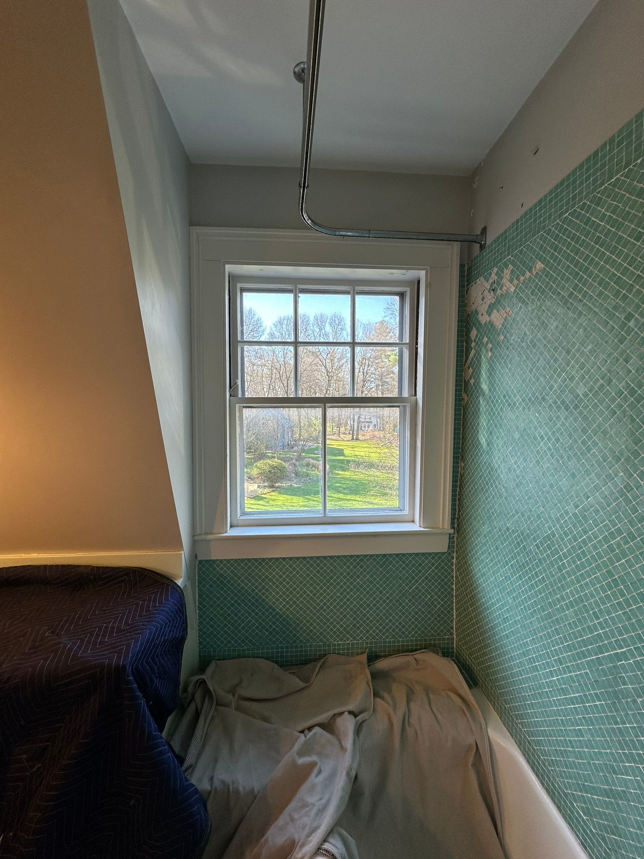 White cedar shingles and windows in Wayland, MA by UBrothers Construction