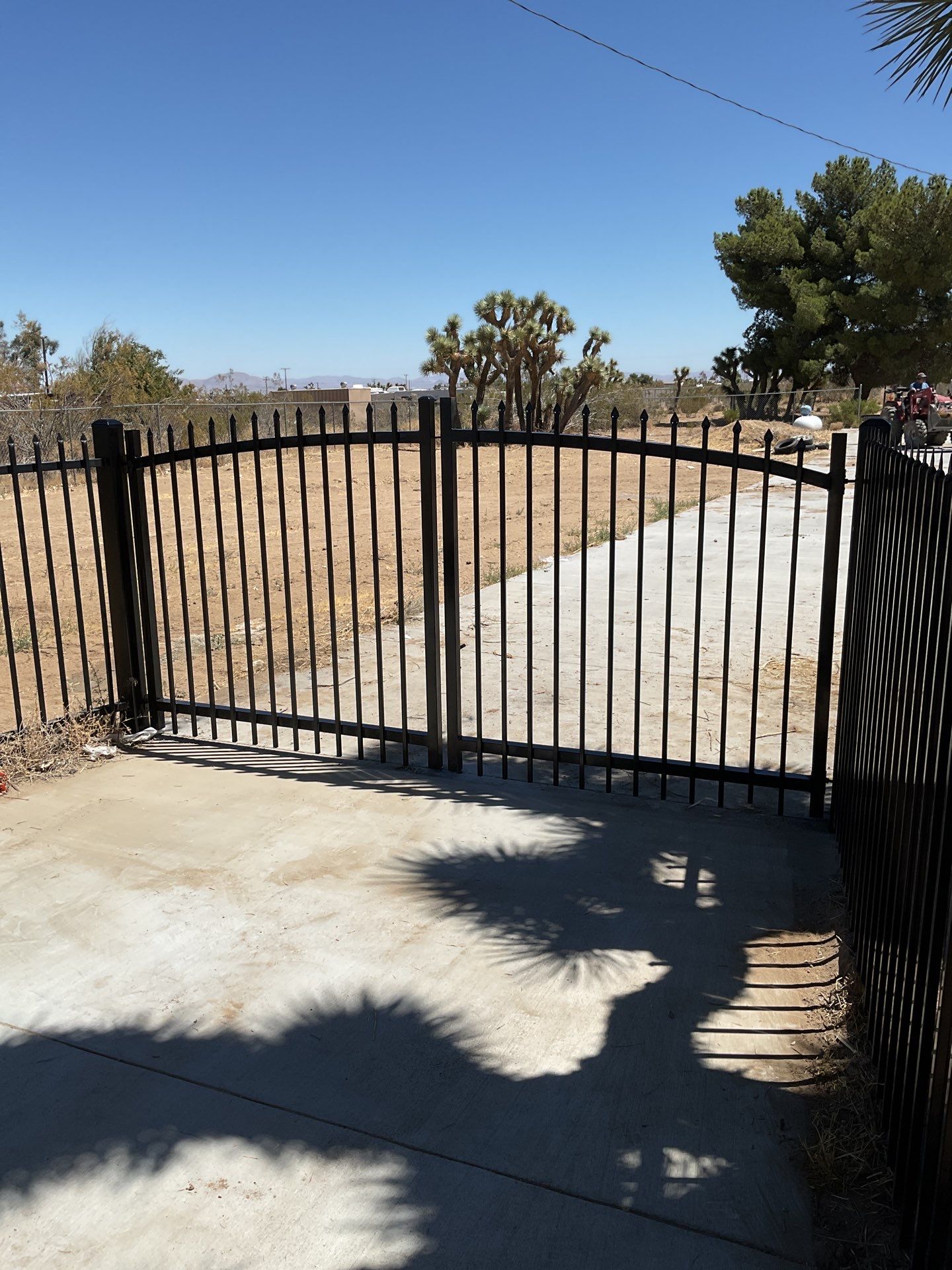 Gate installation using Wrought Iron by Fence Guys Inc. 