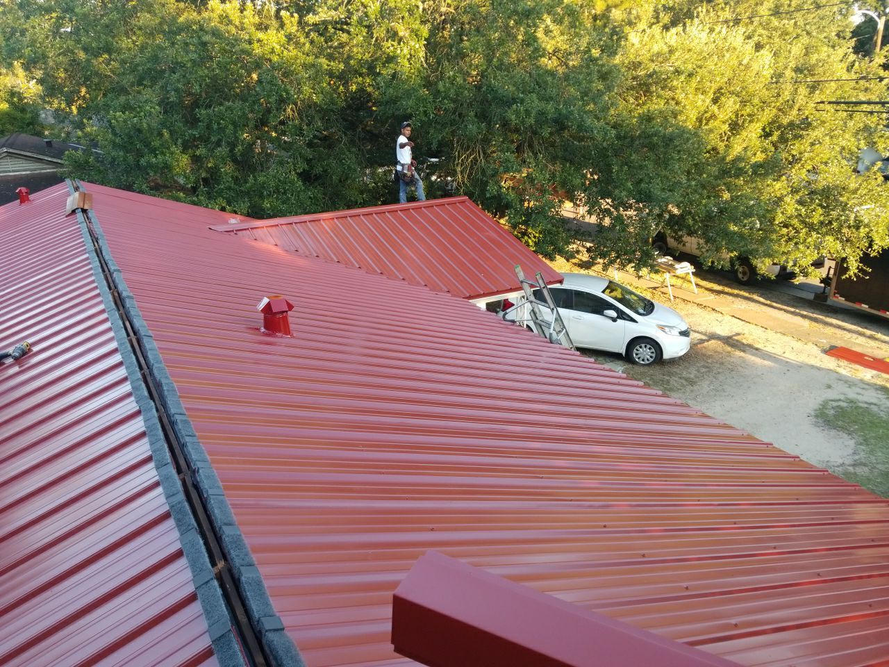 Residential Roofing Installation using Metal roofing by American Roofing & Construction LLC