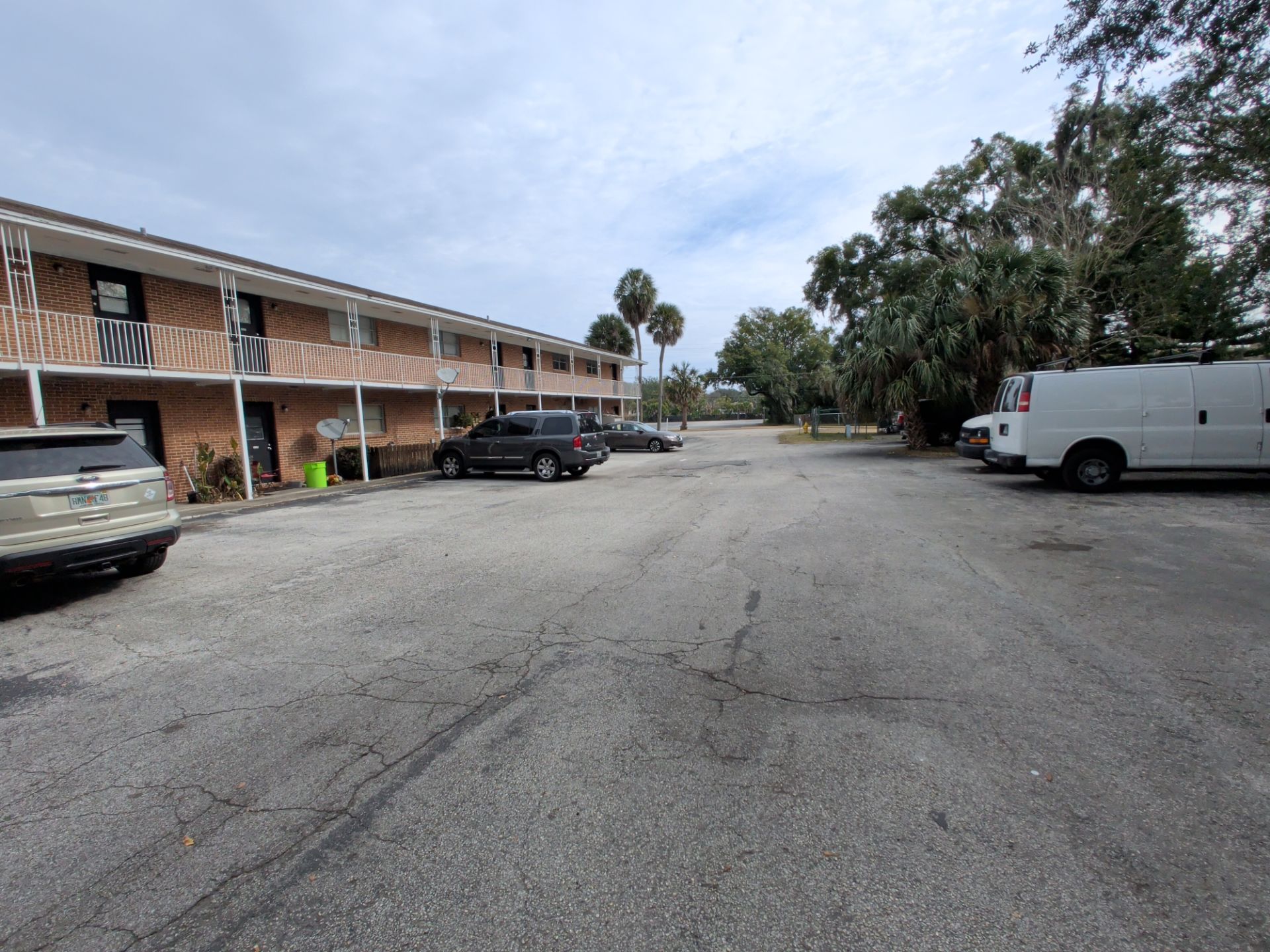 Apartment Landscape Cleanup & Ongoing Grounds Maintenance — Cimarron Apartments (Arlington) by Harmoni Home Services