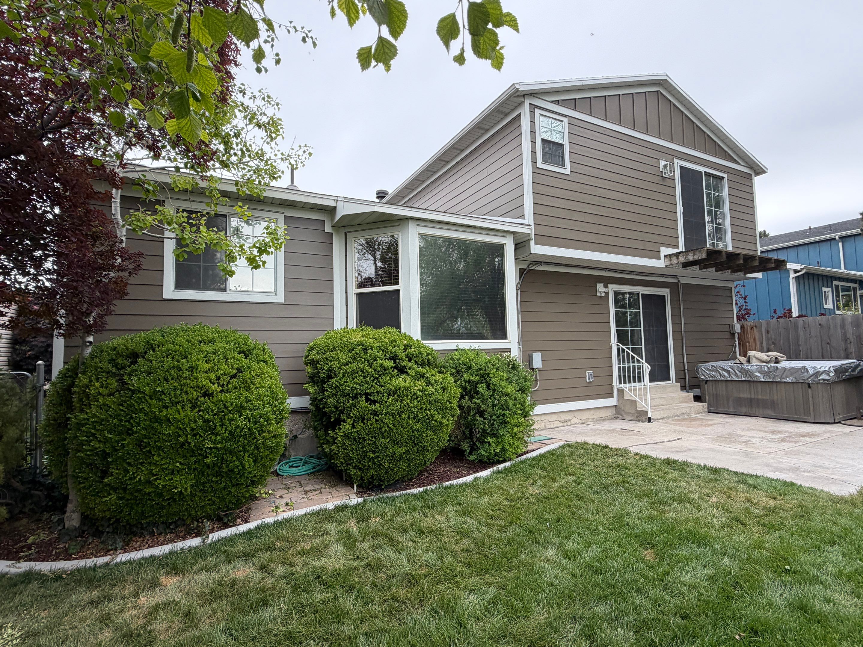 West Valley City | Aluminum to Hardie Conversion | Timber Bark & Arctic White by Ideal Siding Utah