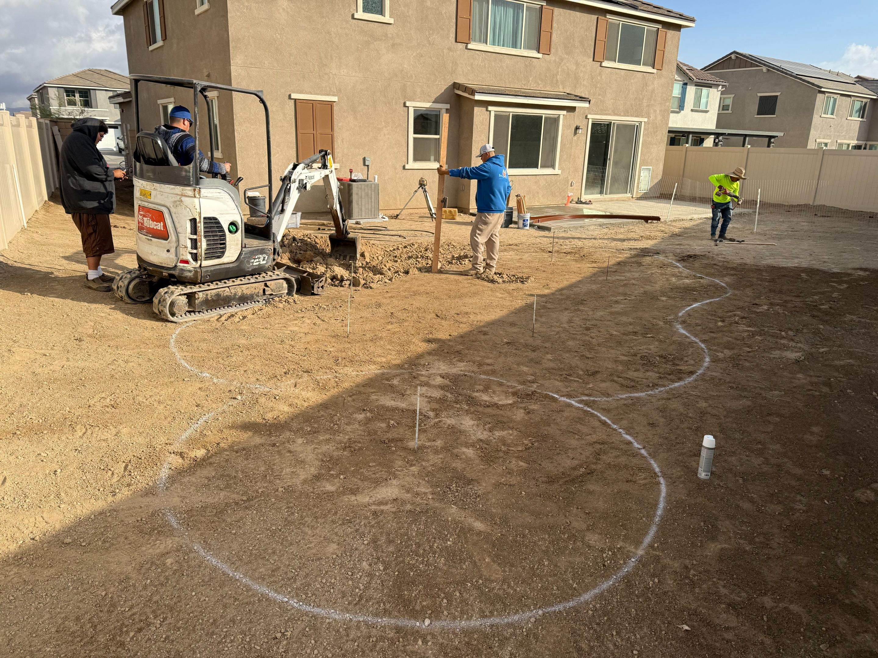 Freeform pool and spa, quartz stone coping on spa, pip on pool by Premier Pools and Spas Temecula