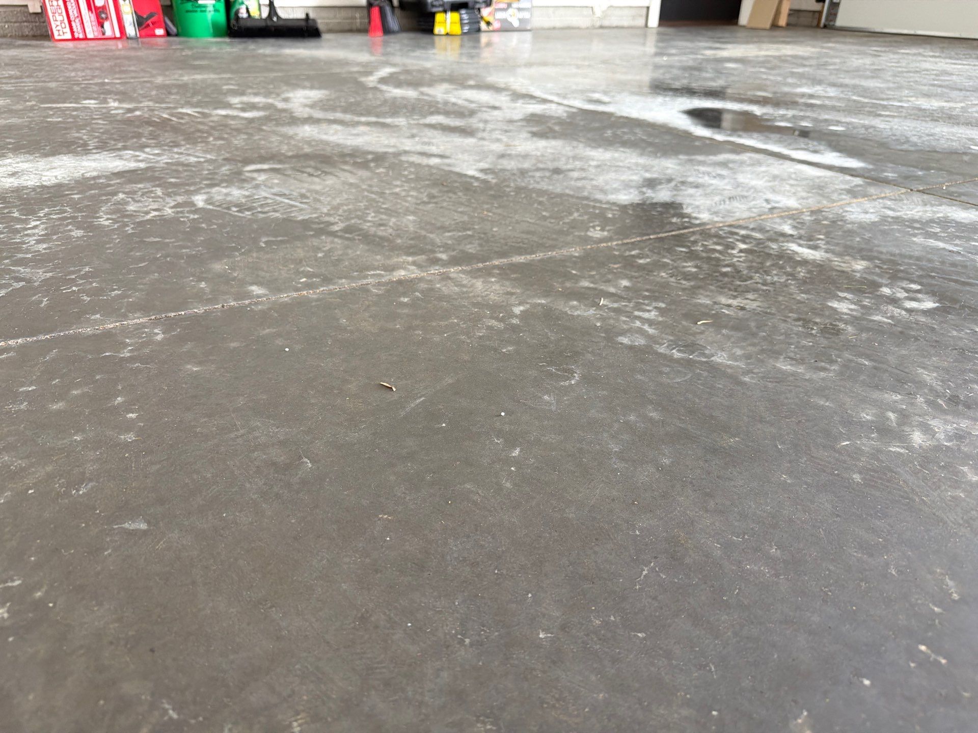Cabin Fever Decorative Flake Garage Floor Coating in Sioux Falls by Select Painting, Coatings & Garage Cabinets