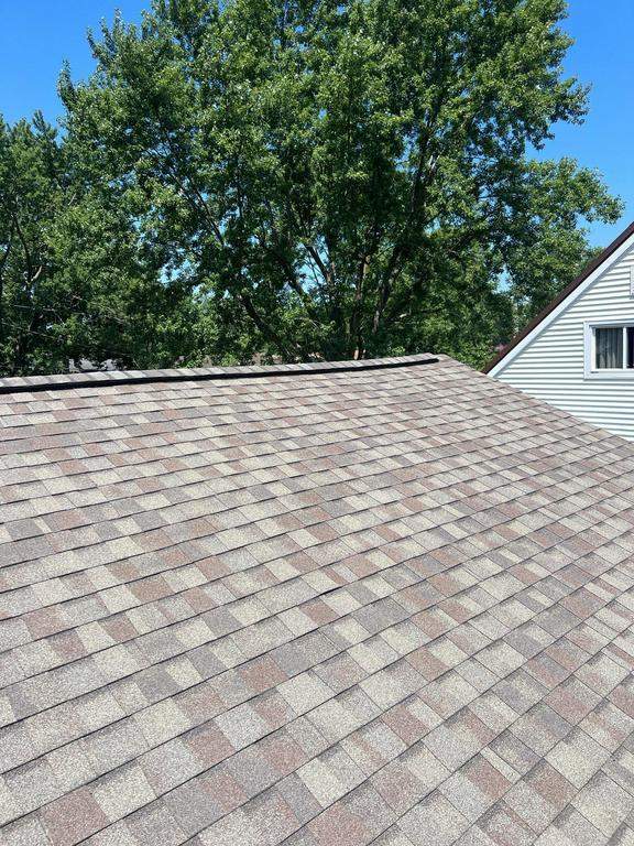 Residential Roofing Repair using Ridge vent replacement by Nitro Roofing and Construction