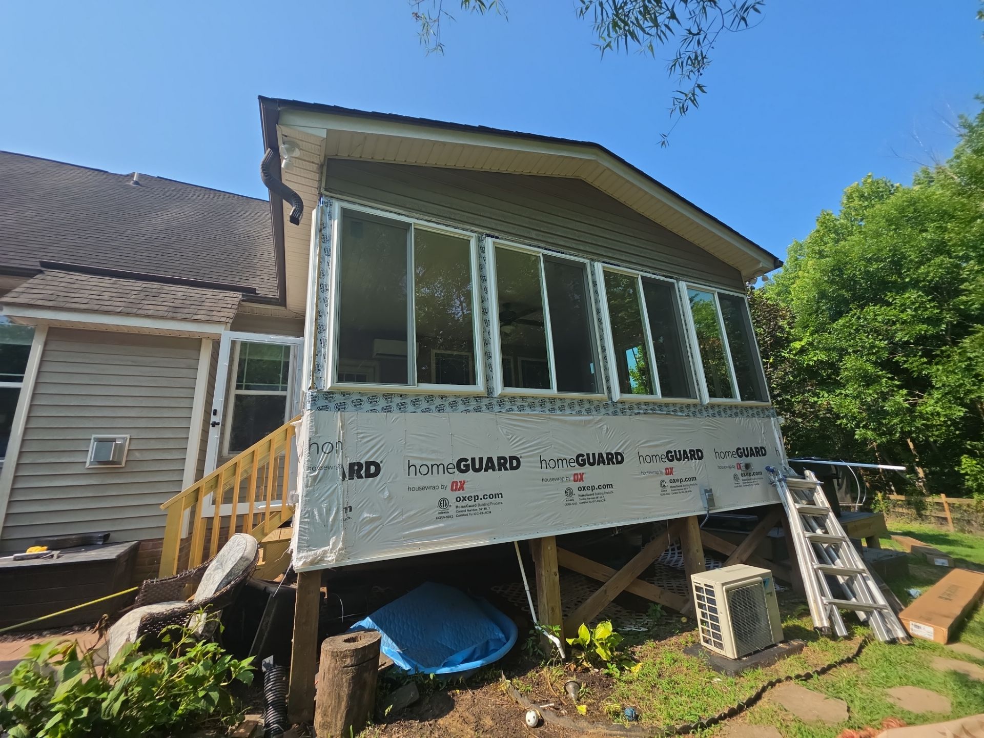 Custom Sunroom Conversion and Screened Porch Addition in Wake Forest by The Remodeling Company