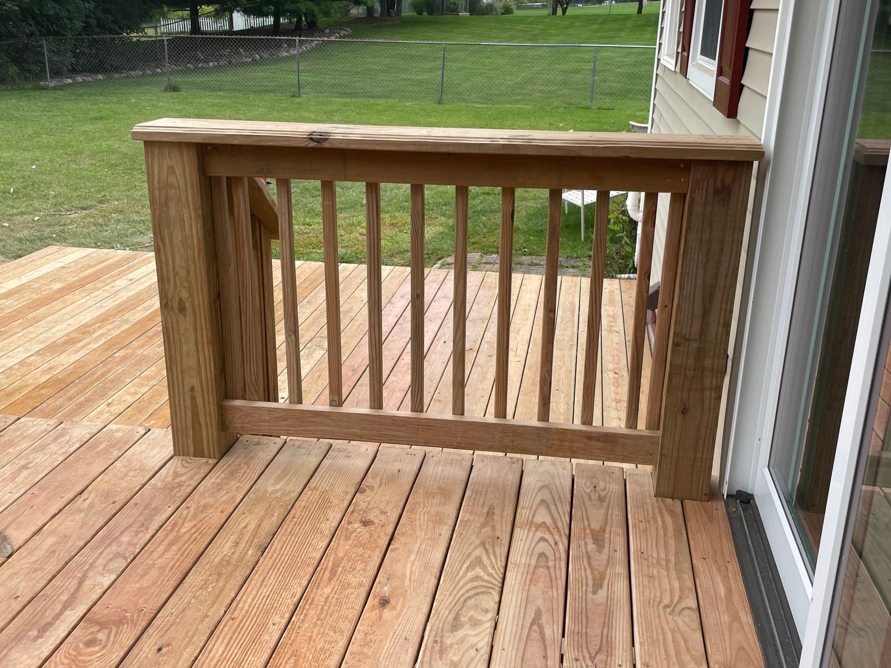 Deck Installation using Treated Lumber by Avalon Roofing and Exteriors