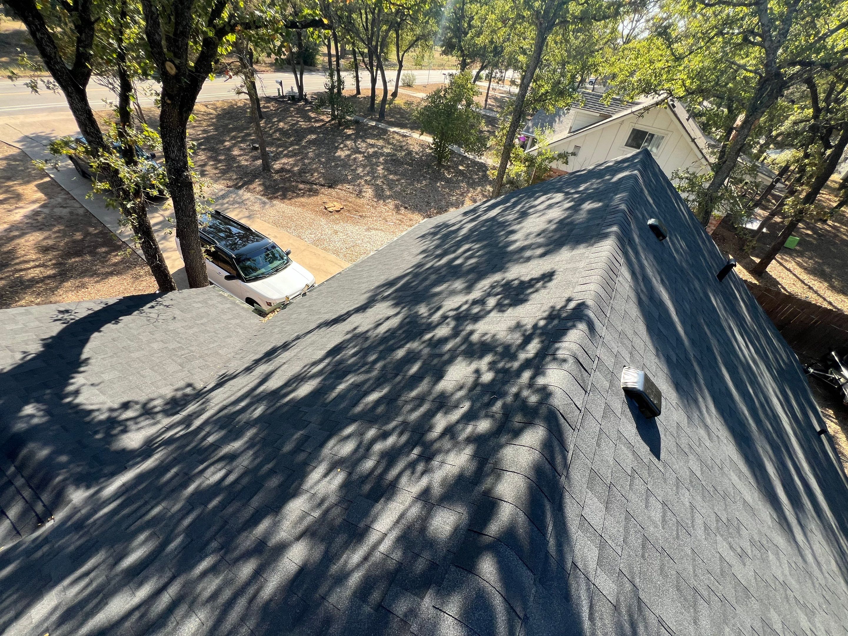 Residential Roofing Installation using IKO Cambridge 30yr Architectural Shingles. Color: Dual Black by WR Roofing Solutions