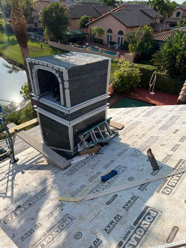 Complete Chimney Rebuild + Tile & Flat Re-Roof  by Morton Roofing, Inc.