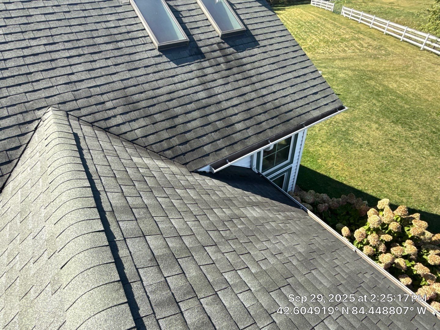 Residential Roofing Replacement with Multiple Skylights in Mason, Michigan by Acme Exteriors