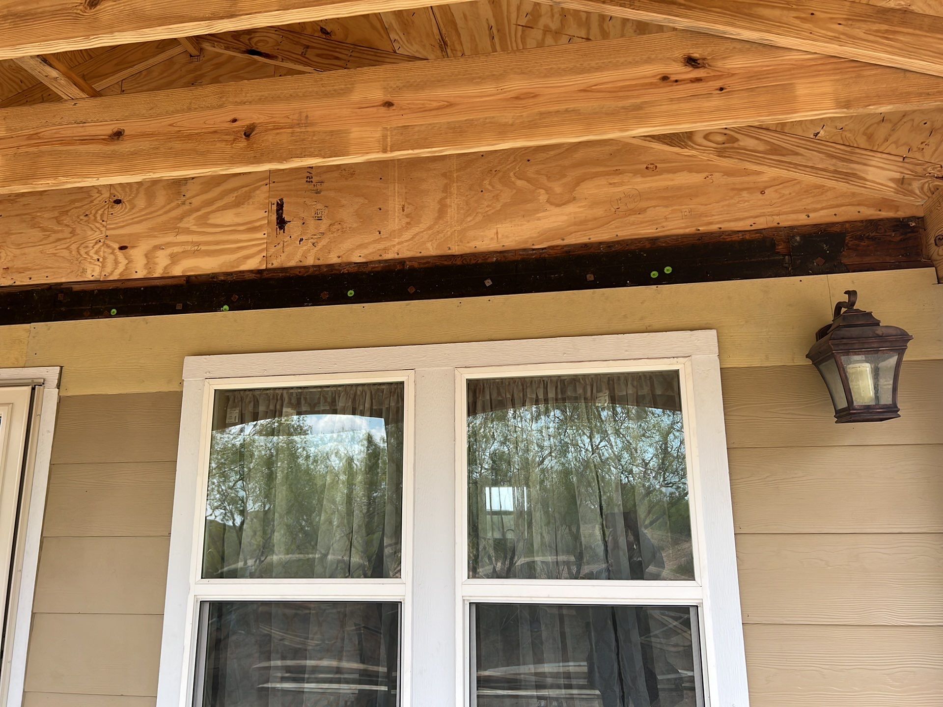 Front Porch Sitt'n by Bayfront Roofing and Construction