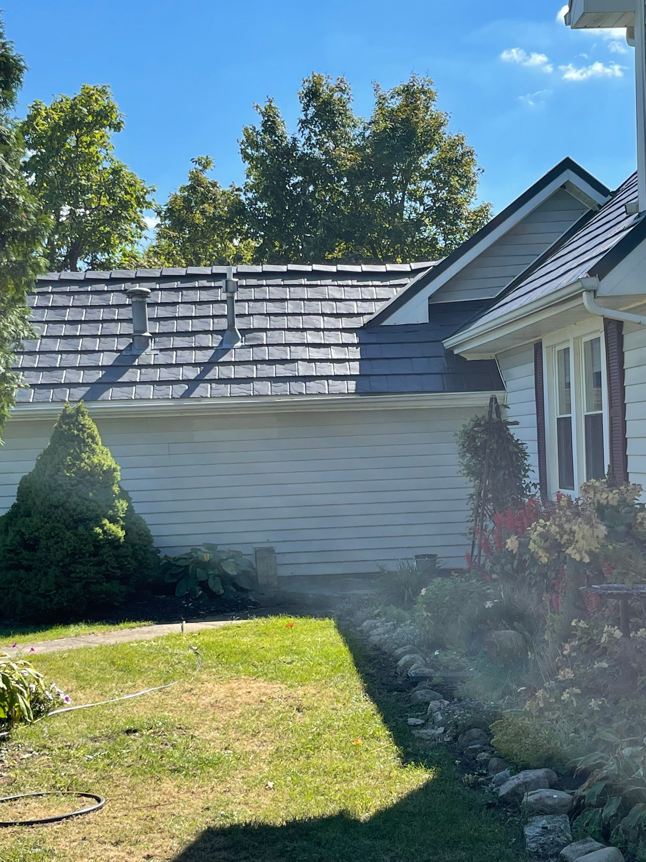 Residential Roofing Installation using Vic West Nothridge Slate by 4Ever Metal Roofing