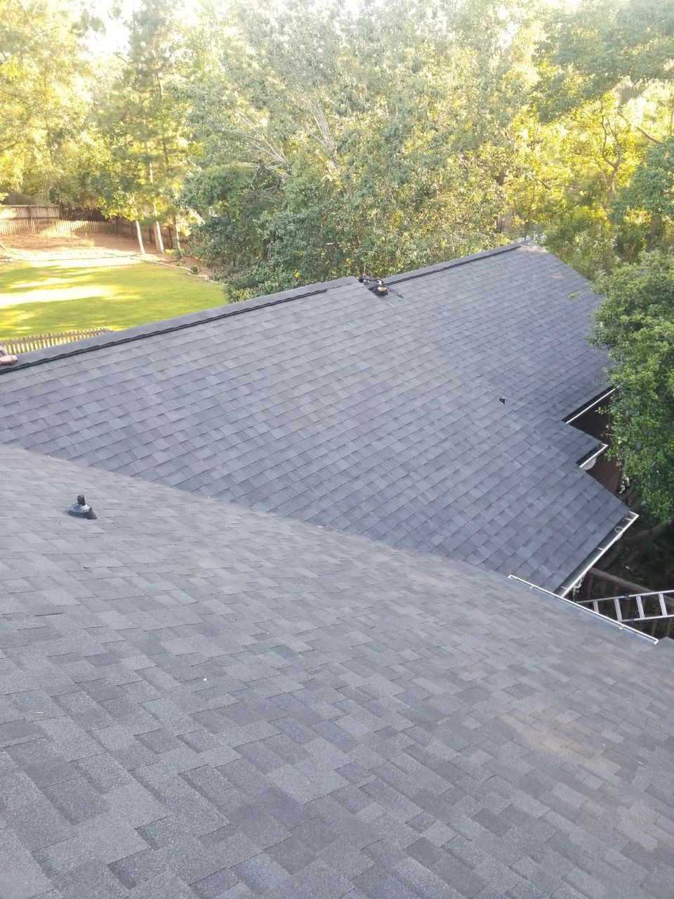 Residential Roofing Installation using Roof Replacement by American Roofing & Construction LLC