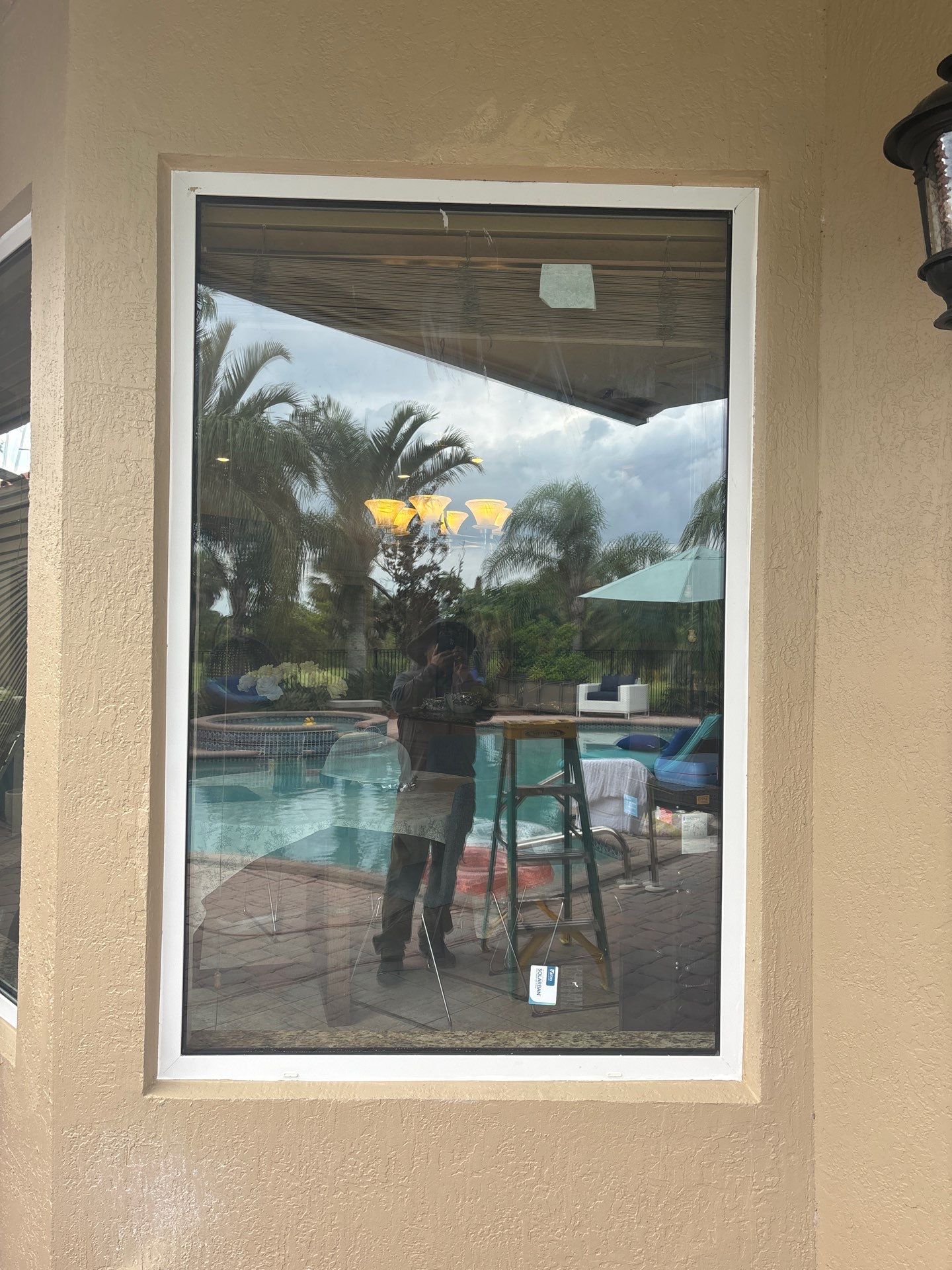 PGT Black pocket doors and Euro-Wall storefront & SGD by Windows For Life 