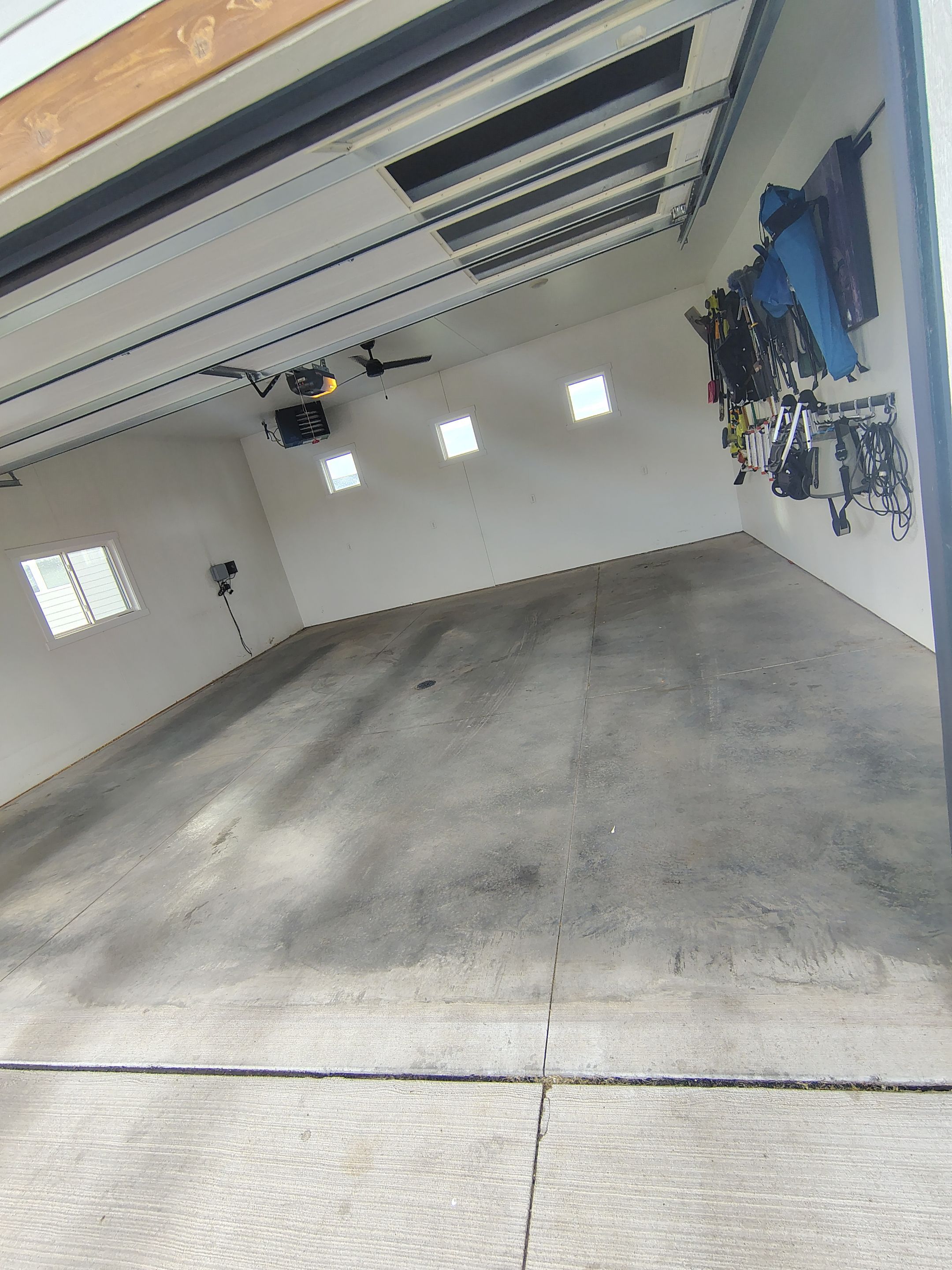 Dell Rapids Multi-Car Garage Concrete Floor Coating and Repair by Select Painting, Coatings & Garage Cabinets